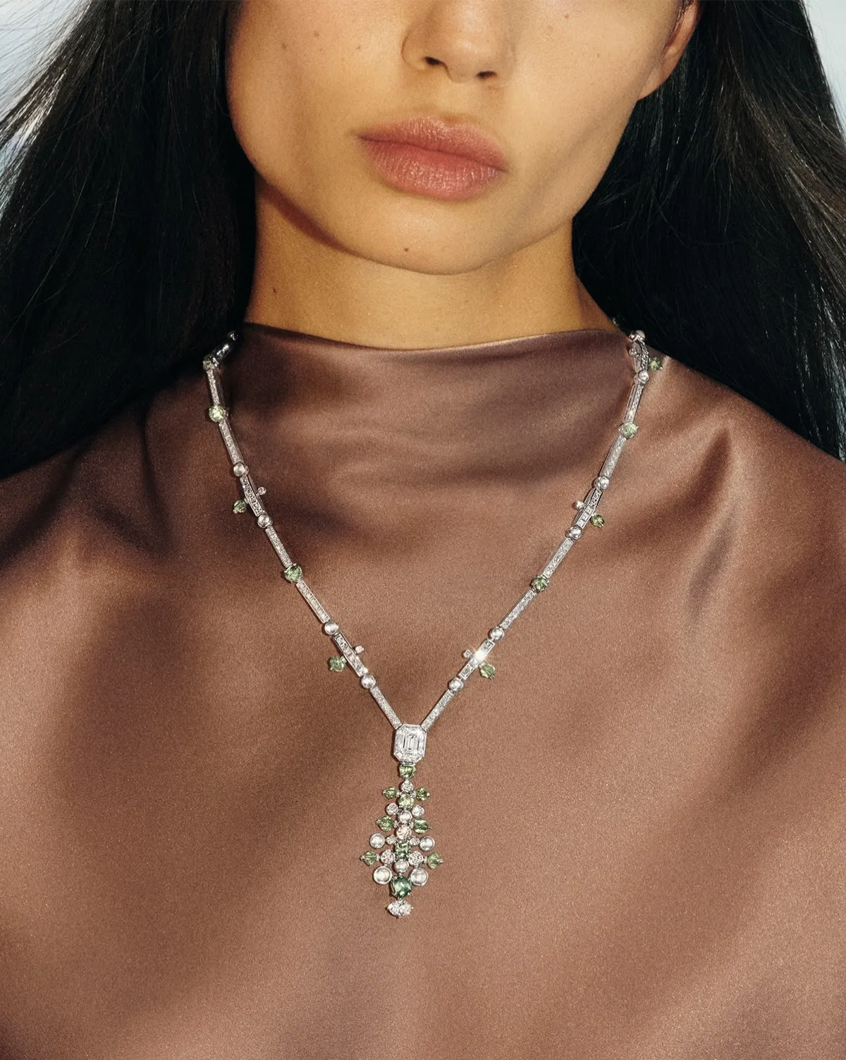 De Beers Undulation Necklace featuring polished white diamonds, rare rough green diamonds and cabochon-cut stones arranged in a flowing, tactile composition