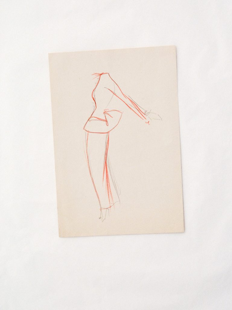 Front view of structured yet fluid silhouette emphasising movement and grace