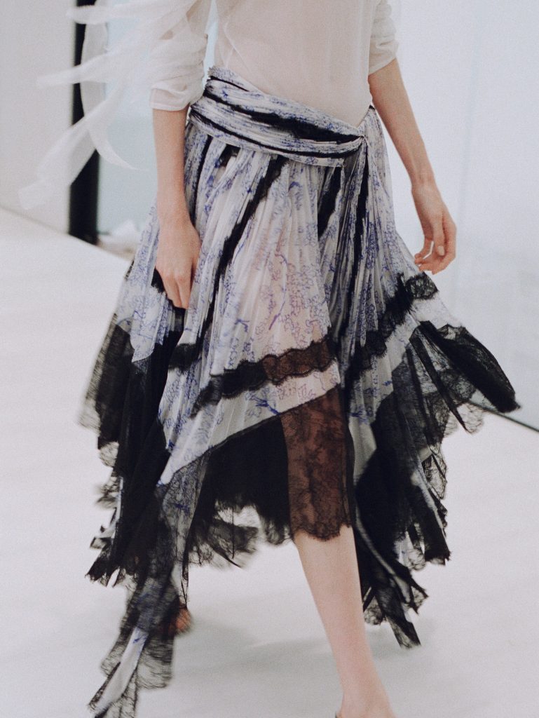Creative direction by Jonathan Anderson: detailed view of model preparation