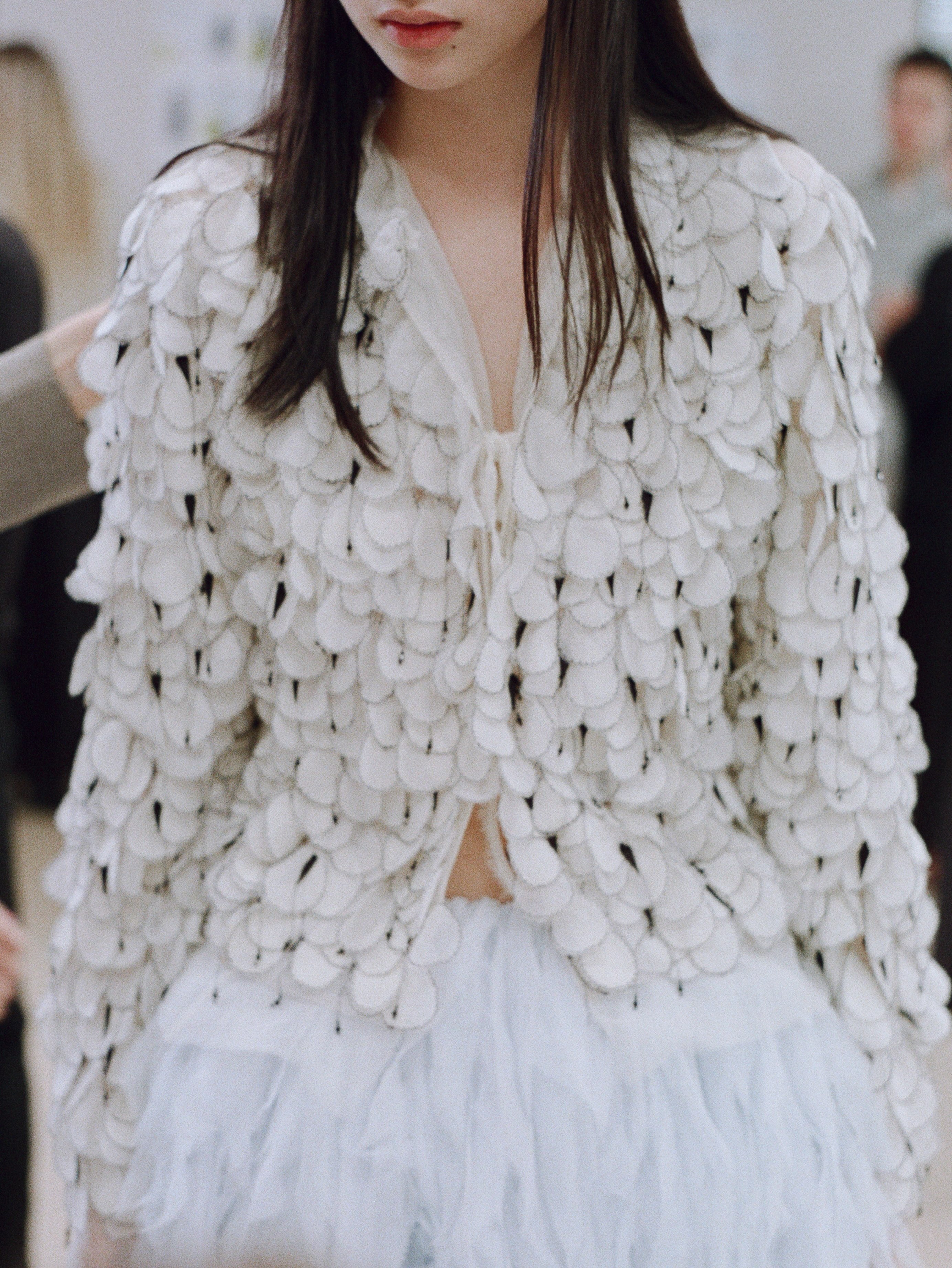 Final preparations and styling by Benjamin Bruno before runway