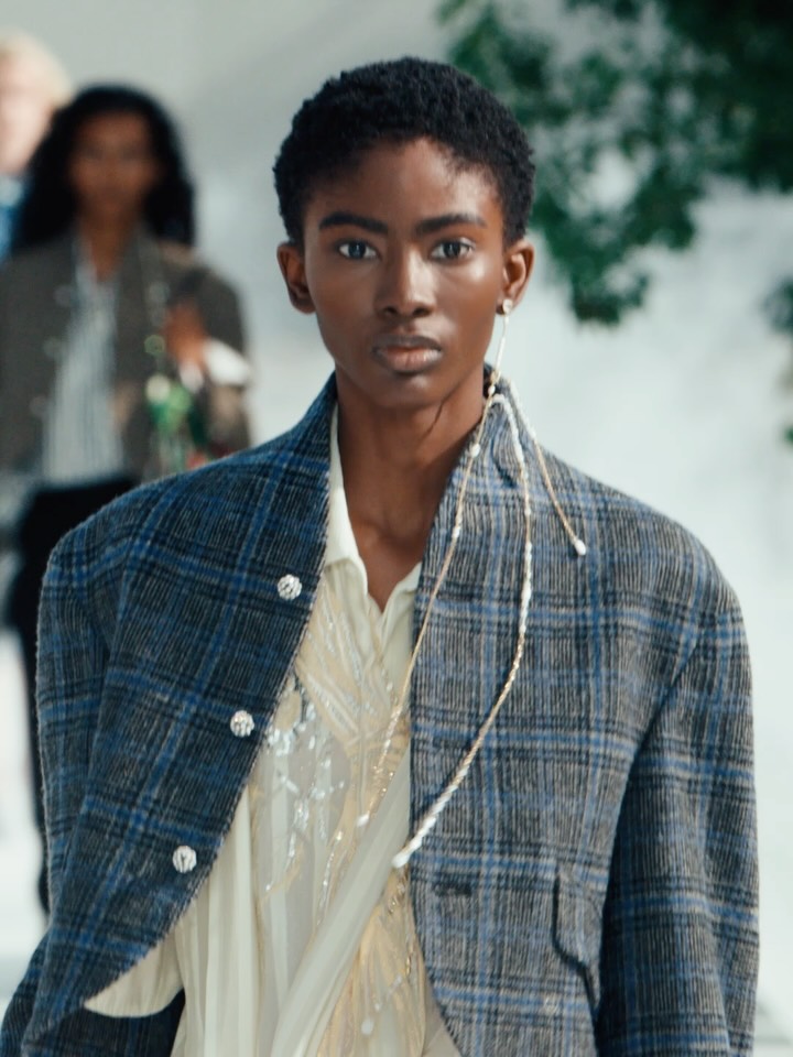 Close-up detail of Peter Philips' silvered eyeshadow and fresh complexion makeup design