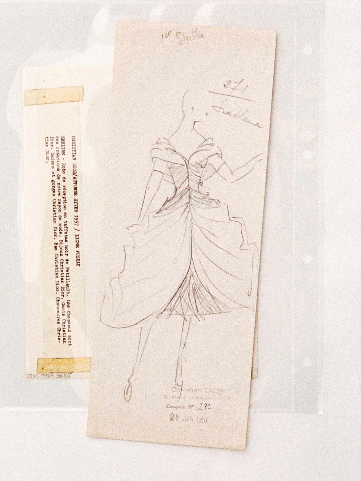 Model in profile showcasing the flowing movement of pleated chiffon layers