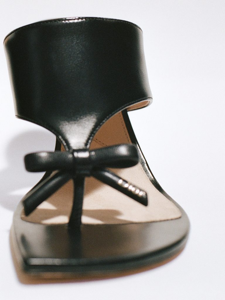 Overhead detail of hand crafted embellishments and material composition