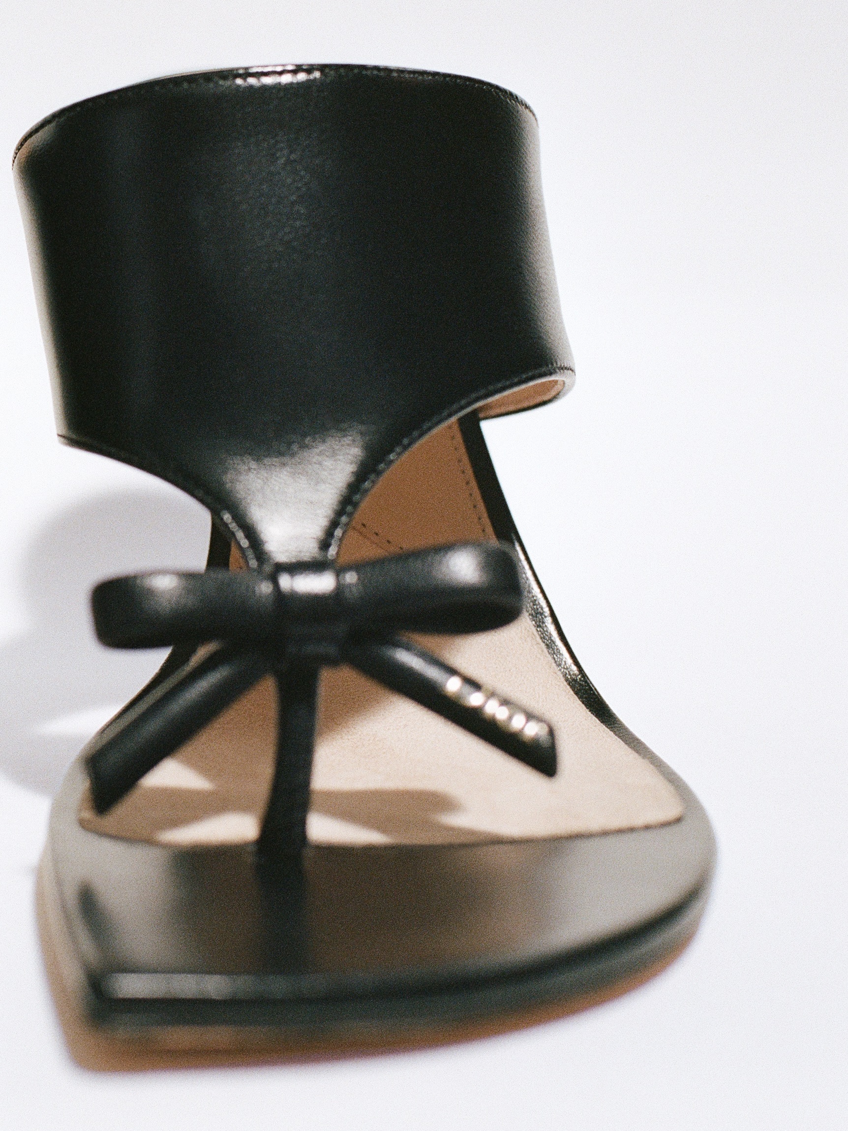 Overhead detail of hand crafted embellishments and material composition