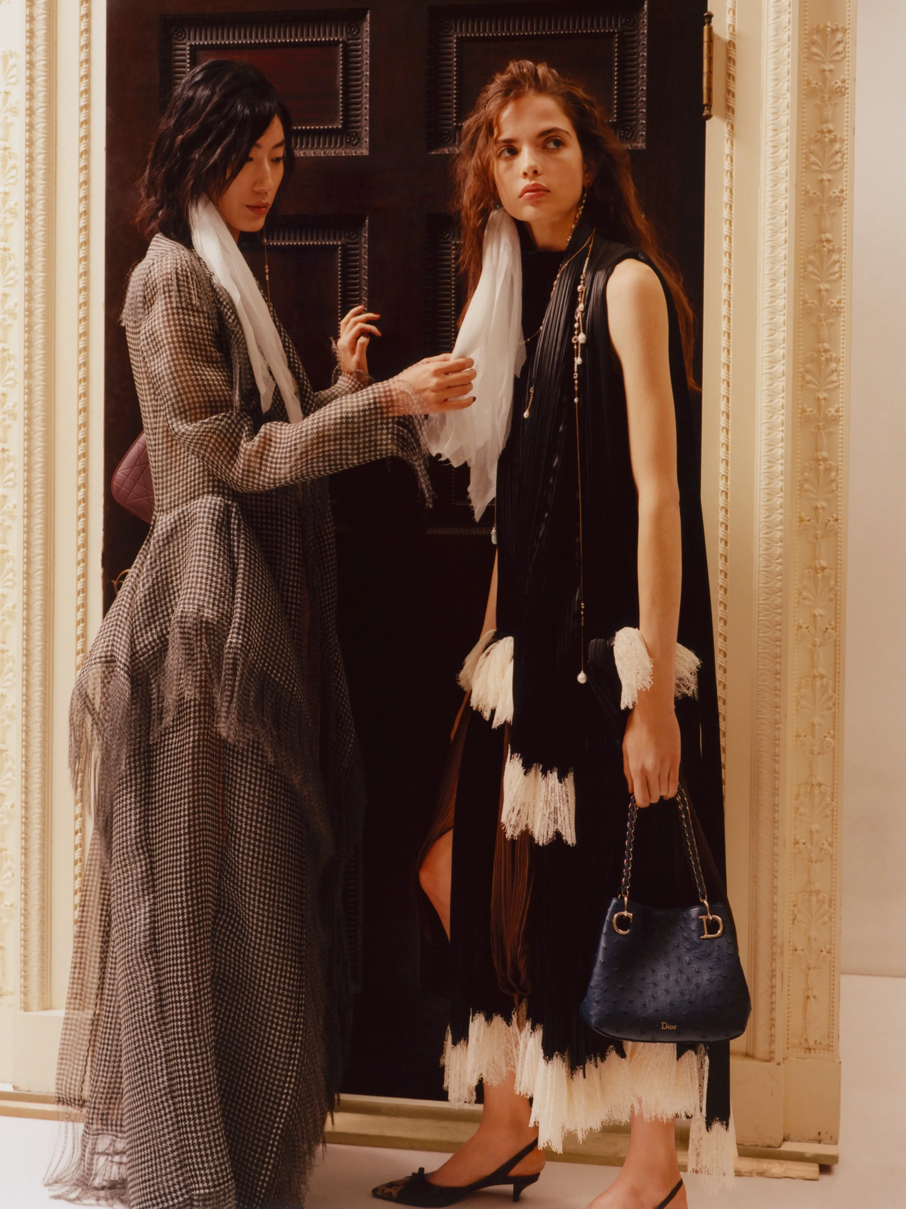 Model wearing structured cream tailored jacket from Dior Summer 2027 collection