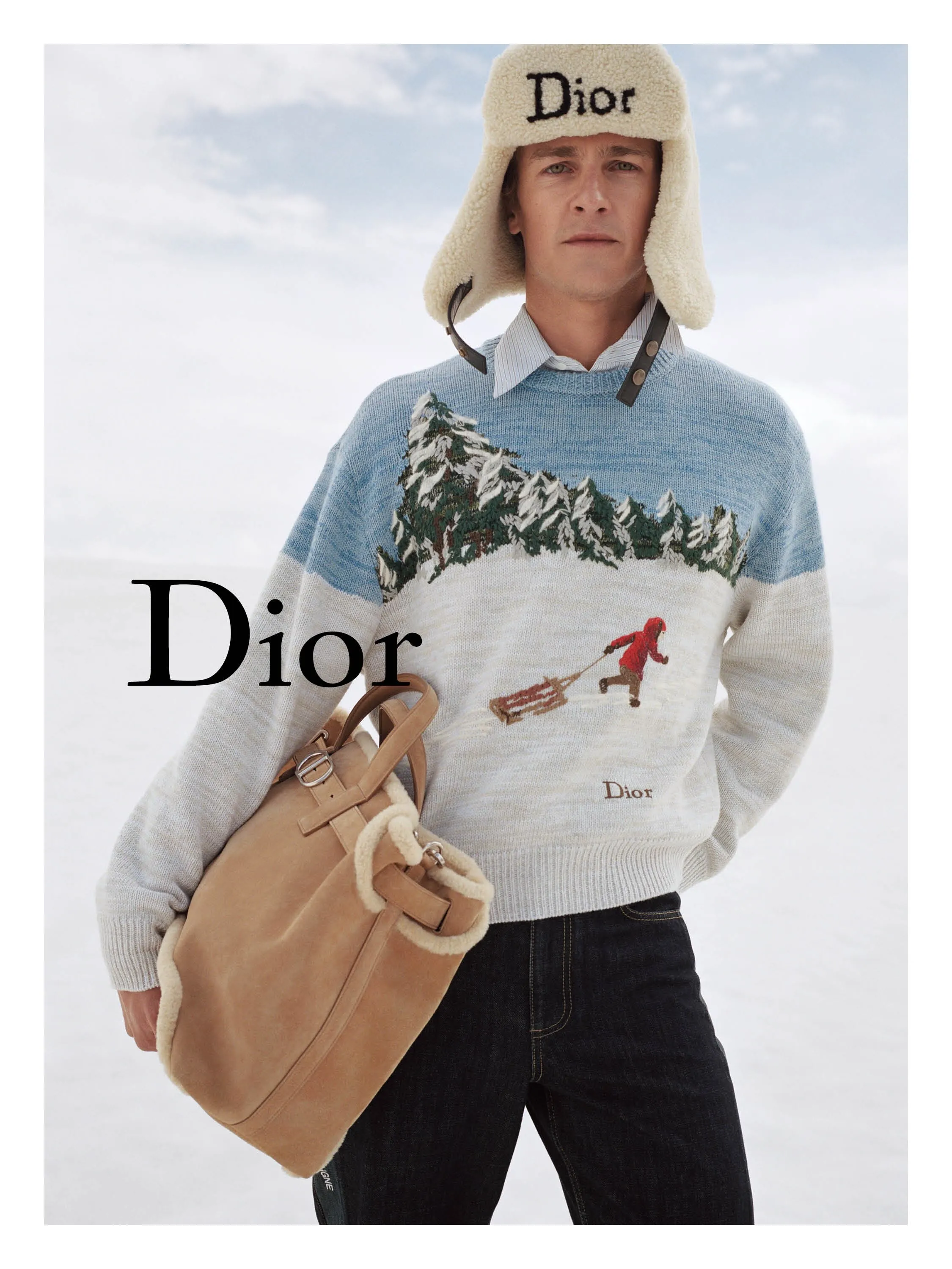 Model wearing Dior Alps 2026 skiwear ensemble in white and neutral tones on mountain backdrop