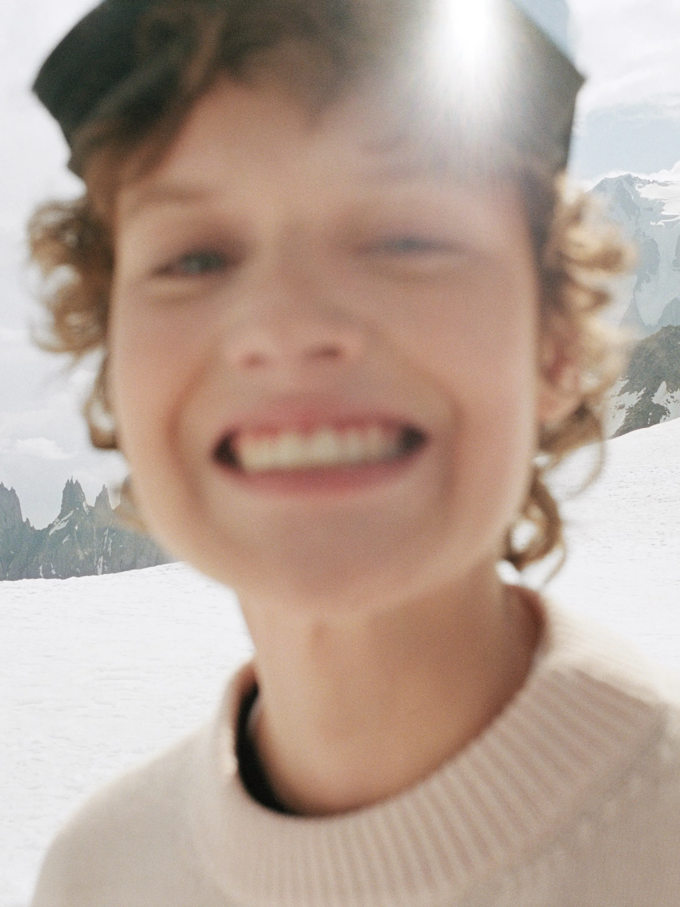 Model wearing Dior Alps 2026 skiwear collection on snowy mountain terrain