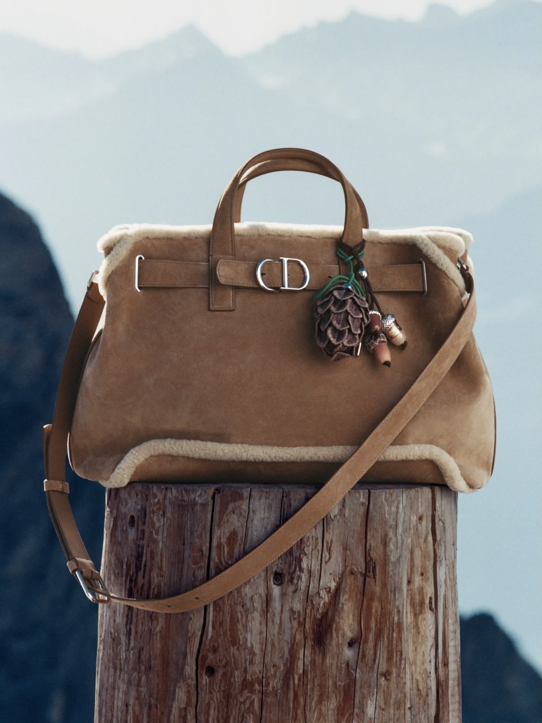 Detailed view of garment textures and luxury finishes in the Dior Alps range