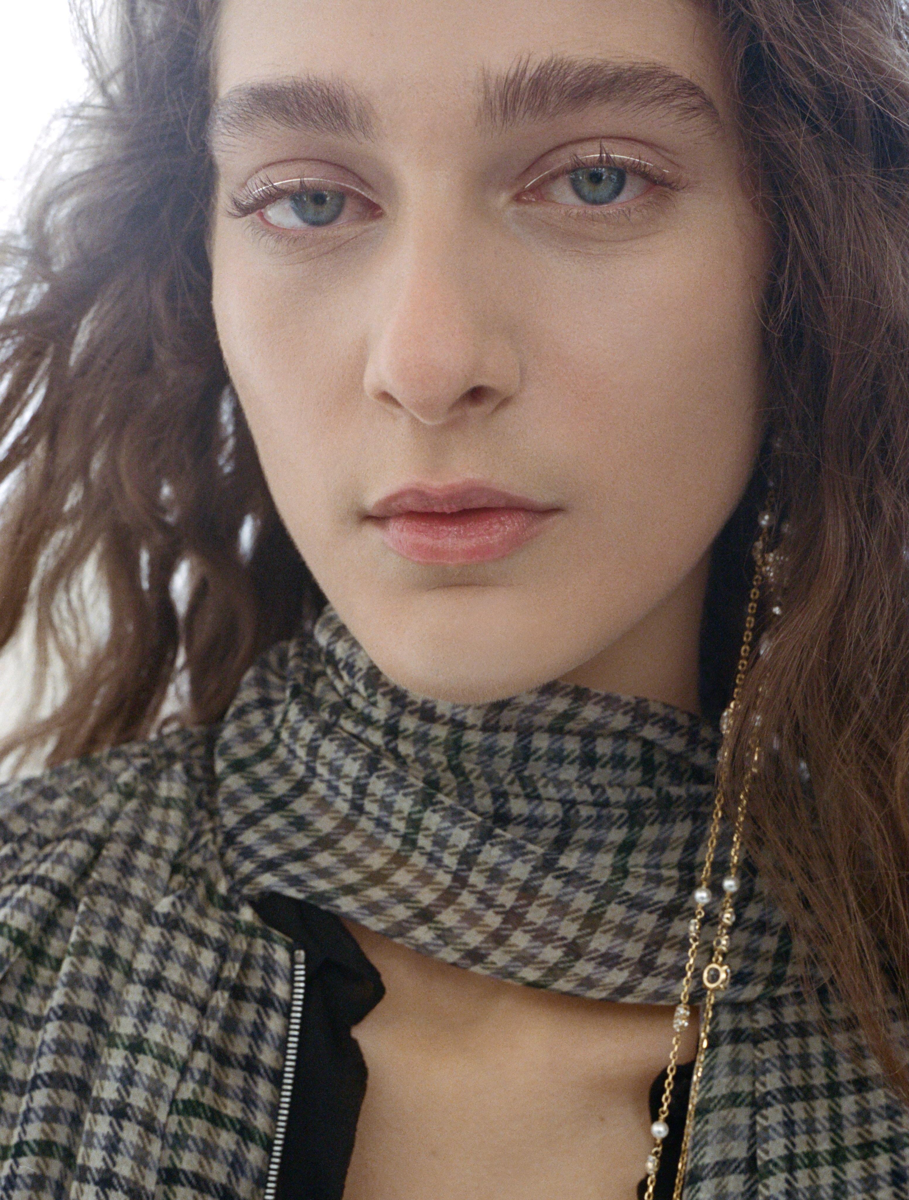 Close-up of radiant skin featuring Dior Rosy Glow and Glassy Glow products
