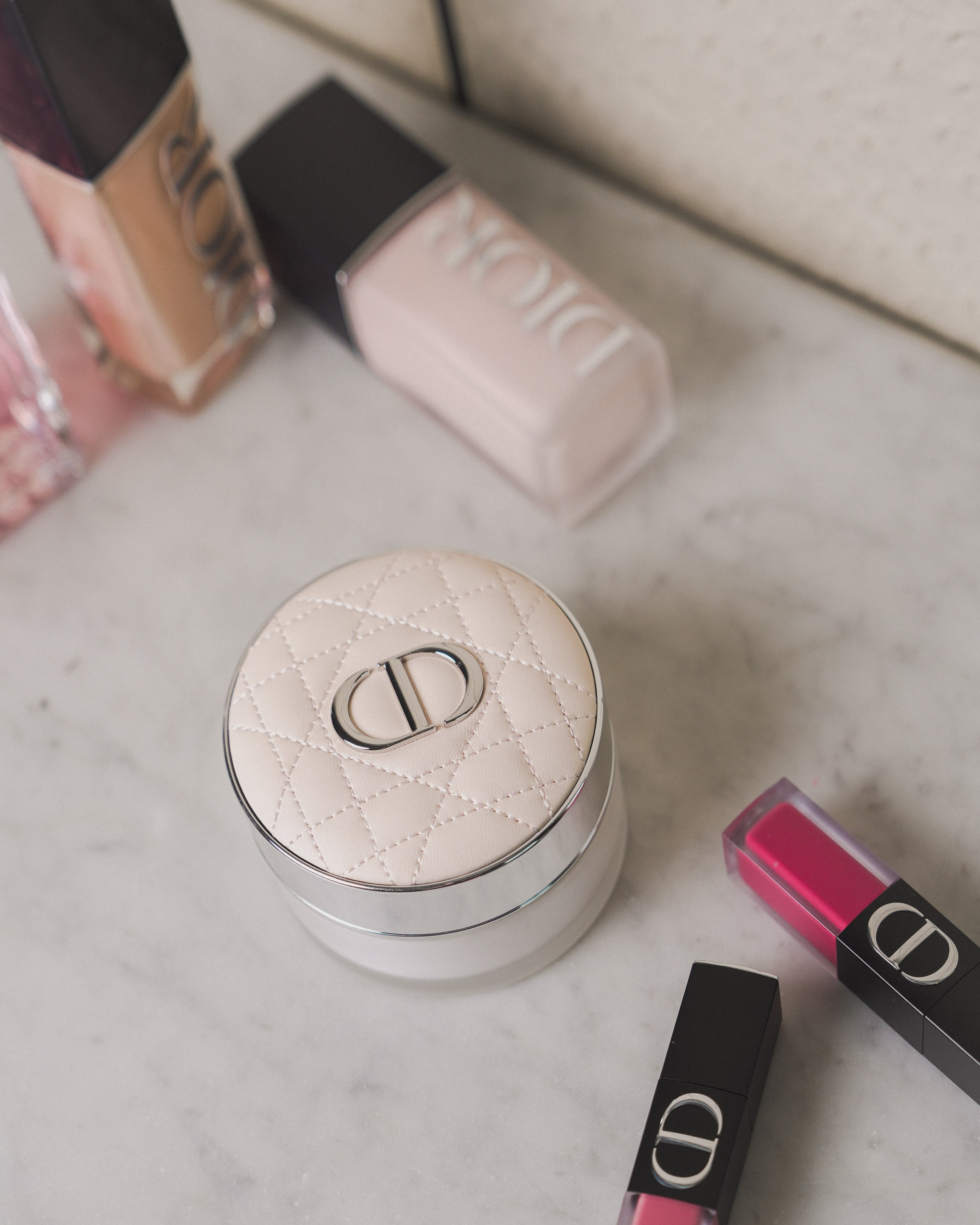 Forever Cushion foundation being blended onto complexion for seamless runway coverage