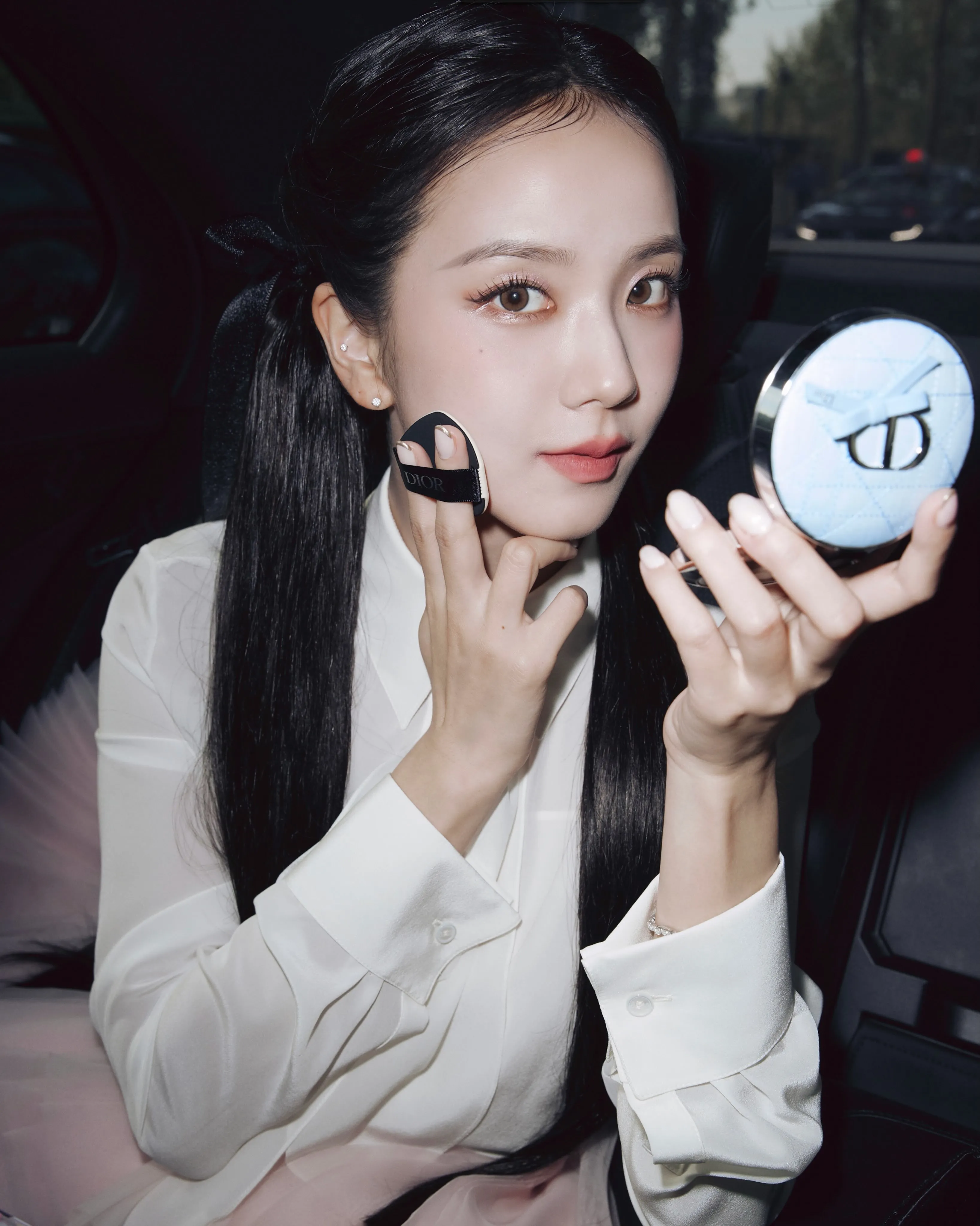 Close-up of expertly applied Dior Beauty makeup featuring Rouge Dior On Stage Ink Blur and Forever Cushion at the Dior Summer 2027 Women's Show