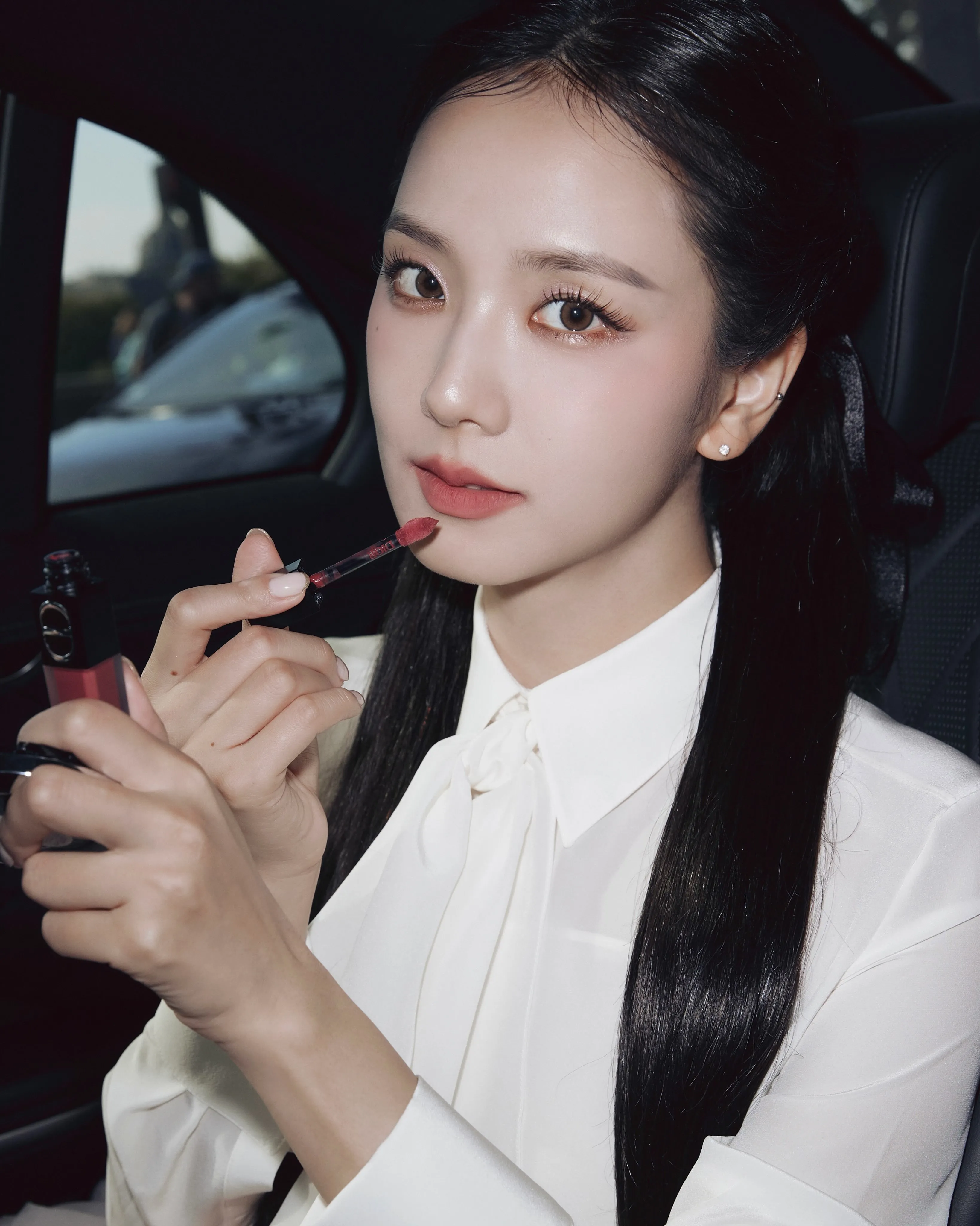 Dior Beauty makeup artistry creating luminous complexion and refined lip colour for the Summer 2027 runway show