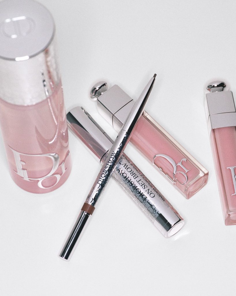 Backstage view of Dior Beauty products including Airflash Mist, Addict Lip Maximizer and Diorshow On Set Brow