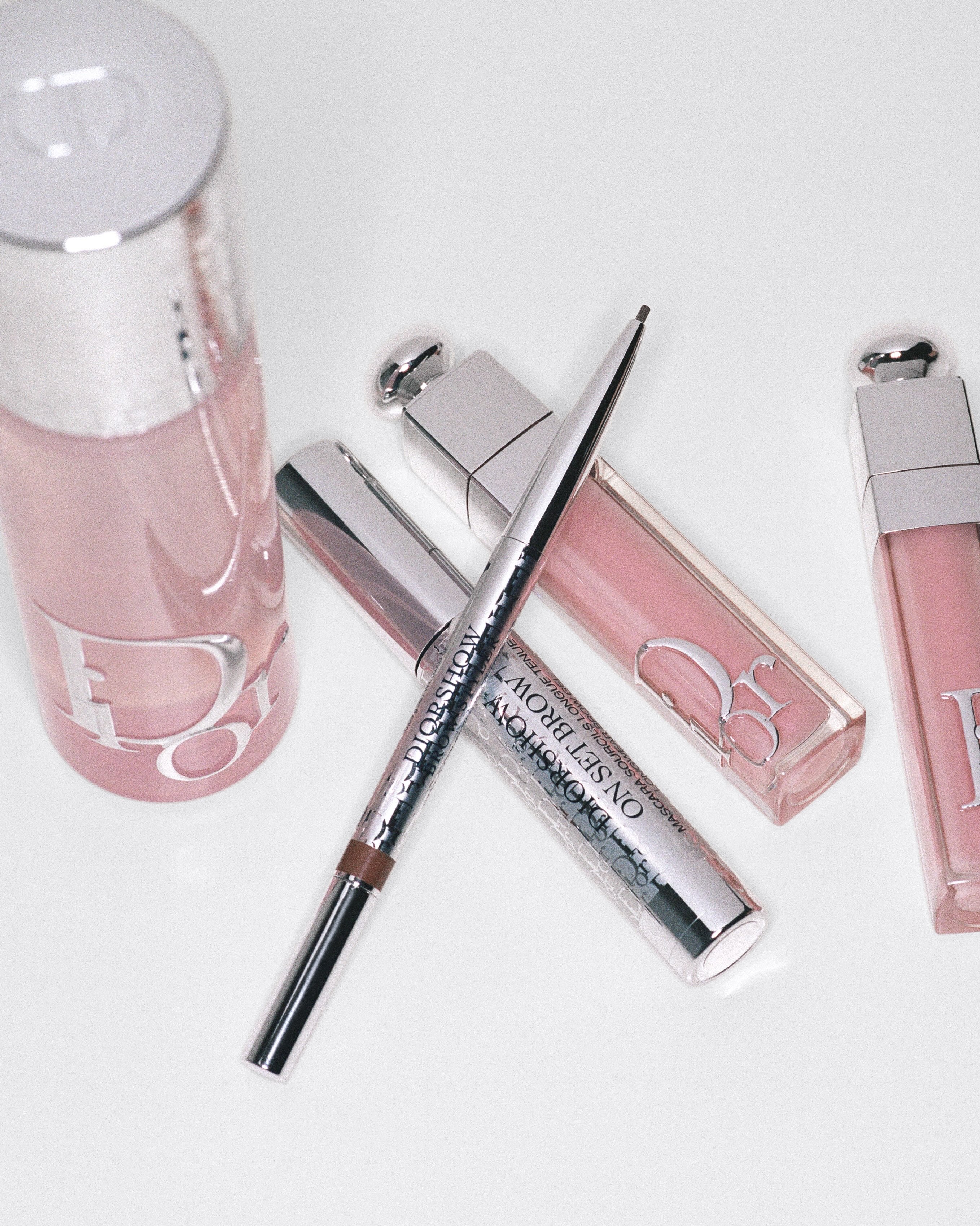Backstage view of Dior Beauty products including Airflash Mist, Addict Lip Maximizer and Diorshow On Set Brow