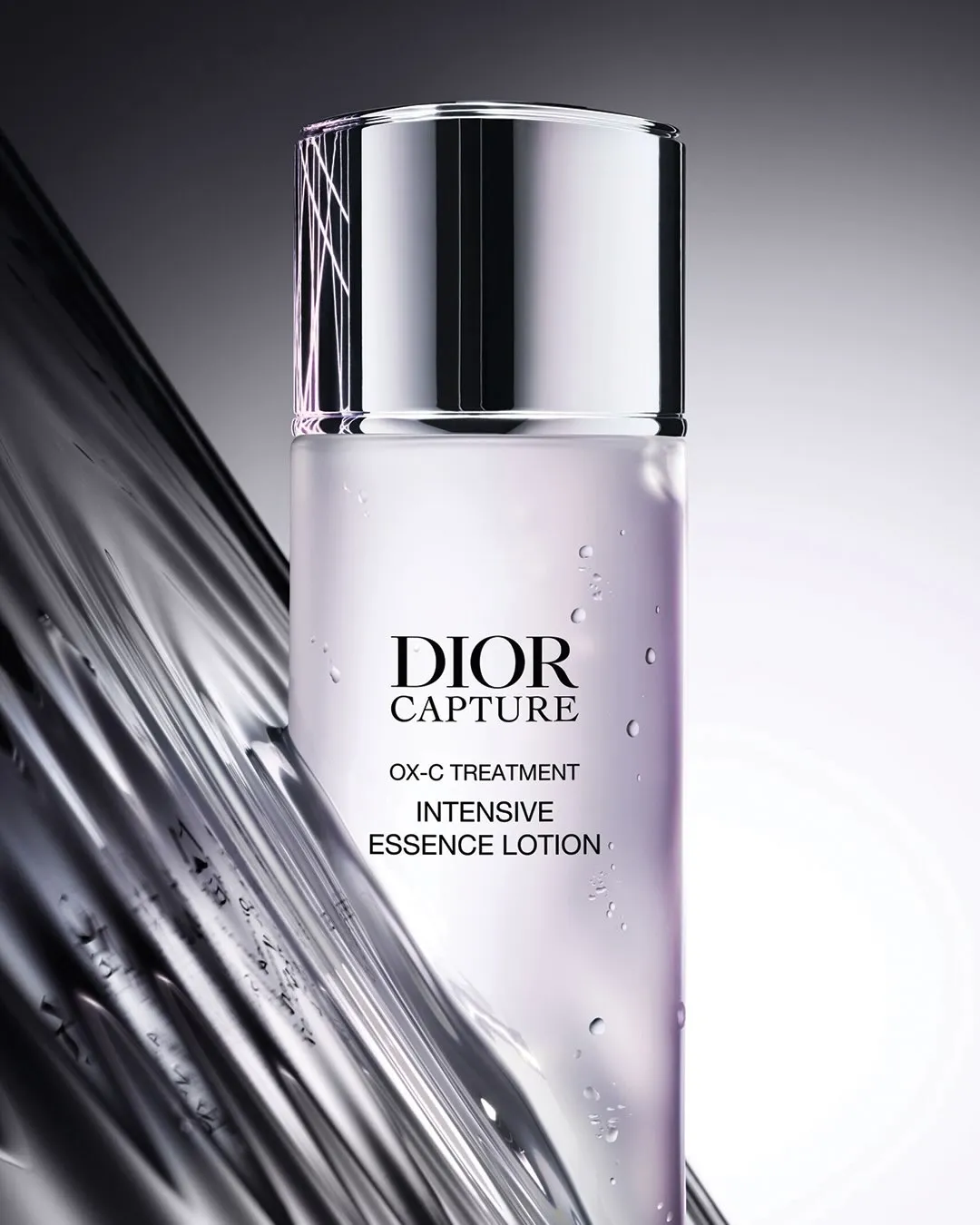Dior Capture Intensive Essence Lotion bottle displaying its elegant glass vessel and refined packaging design