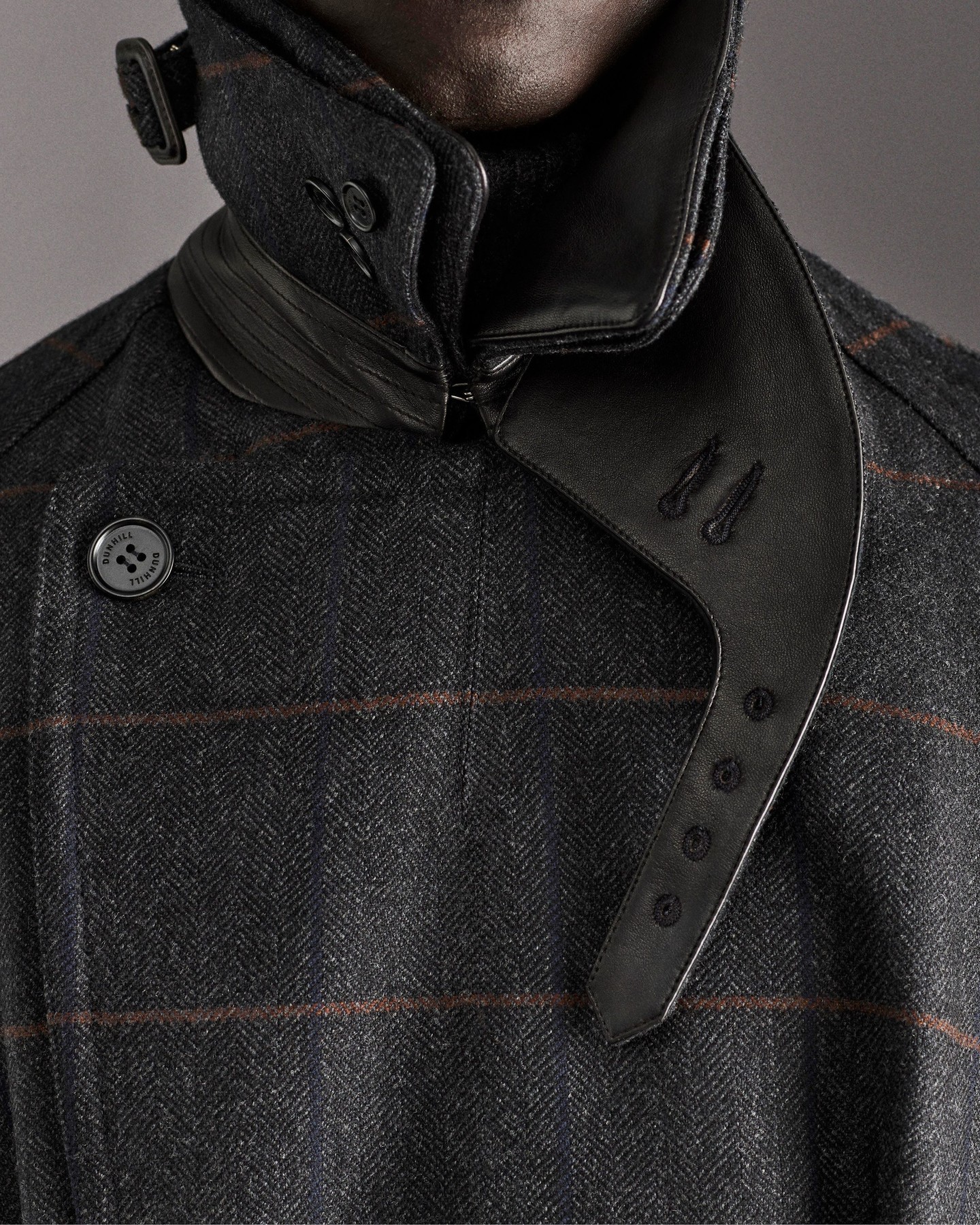 Dunhill trench coat showcasing hand-painted French lambskin collar detail with matching leatherwork at collar stand