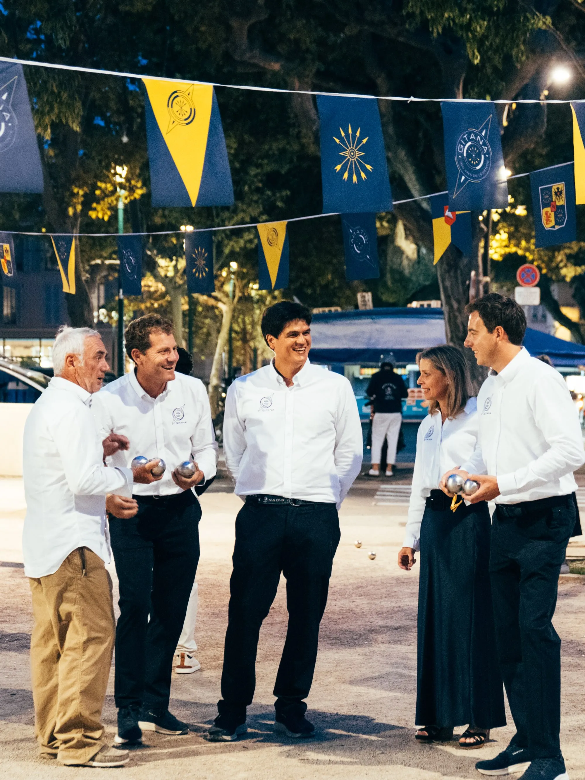 Ariane de Rothschild and Gitana Team members gathered at Place des Lices for the commemorative pétanque tournament