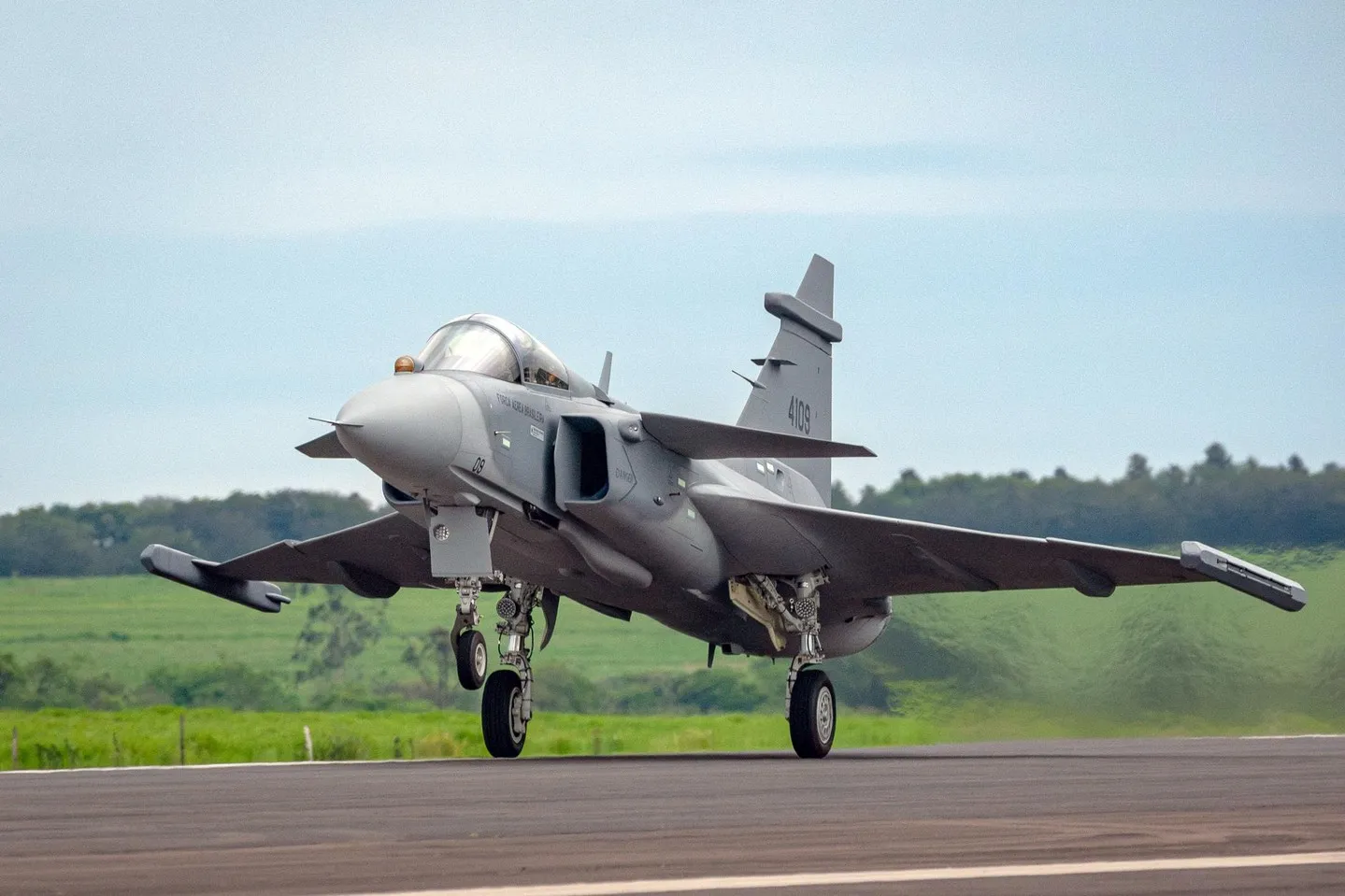 Gripen E fighter aircraft in flight during maiden test sortie from Embraer's Gavião Peixoto facility