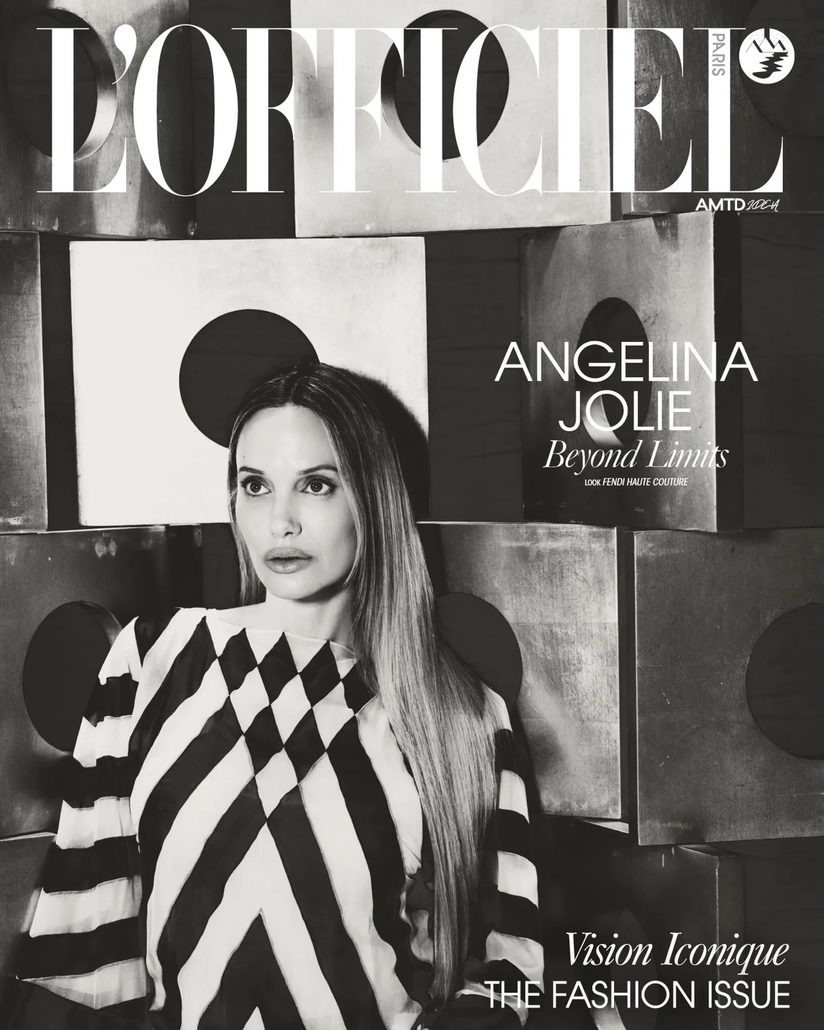 Angelina Jolie on the cover of L'Officiel Paris wearing an elegant Fendi Couture design by Maria Grazia Chiuri