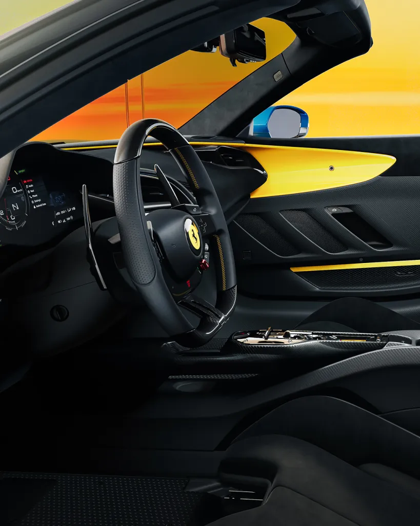 Ferrari SF90 XX Spider in profile highlighting the elegant proportions and open-top convertible configuration