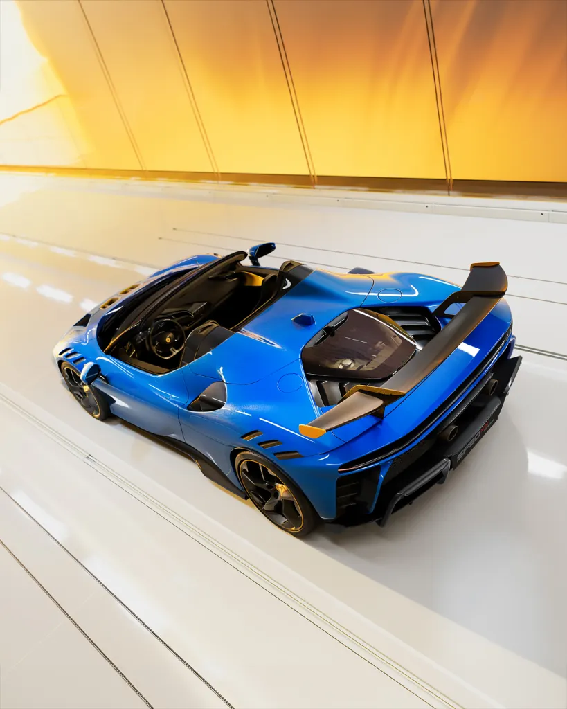 Rear view of the Ferrari SF90 XX Spider emphasizing the sculpted design and performance-oriented stance