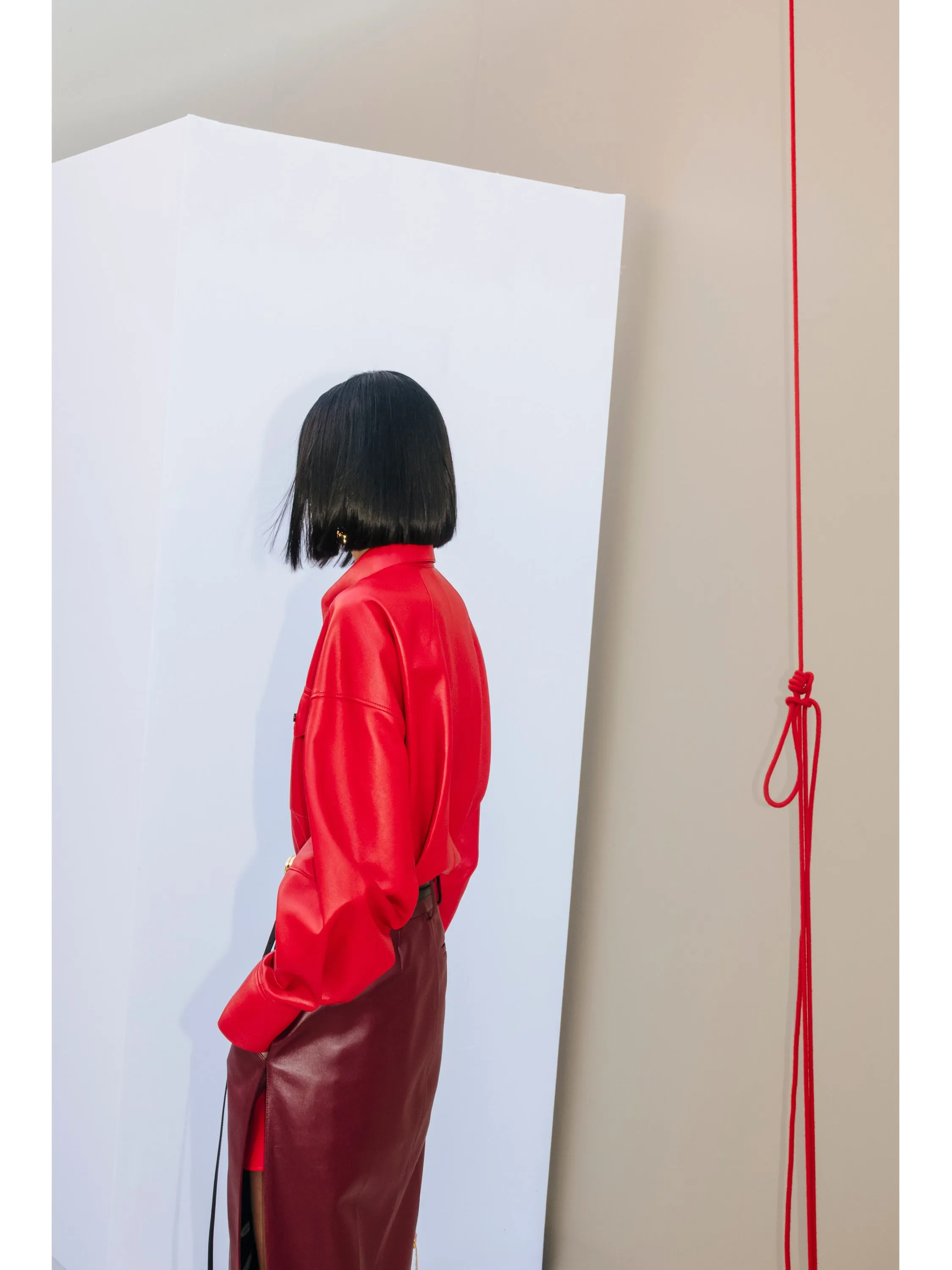 Wide-leg trousers paired with fitted bodice demonstrating versatile silhouette