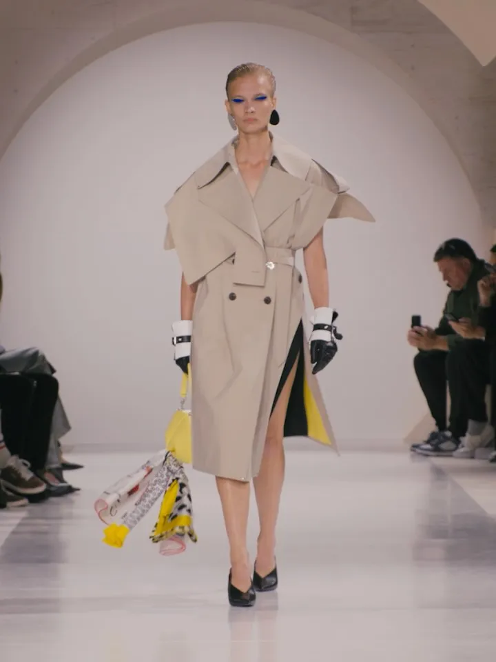 Model Frankie styled in slashed gabardine trench and coordinated pieces