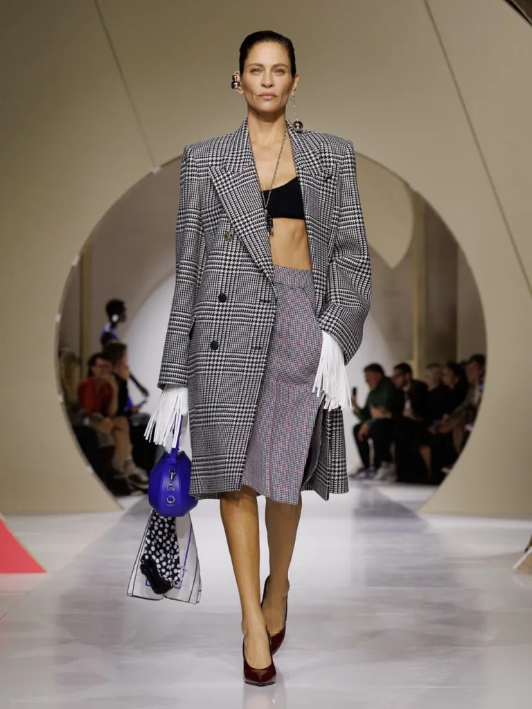 Checked coat detail demonstrating the precision of pattern placement