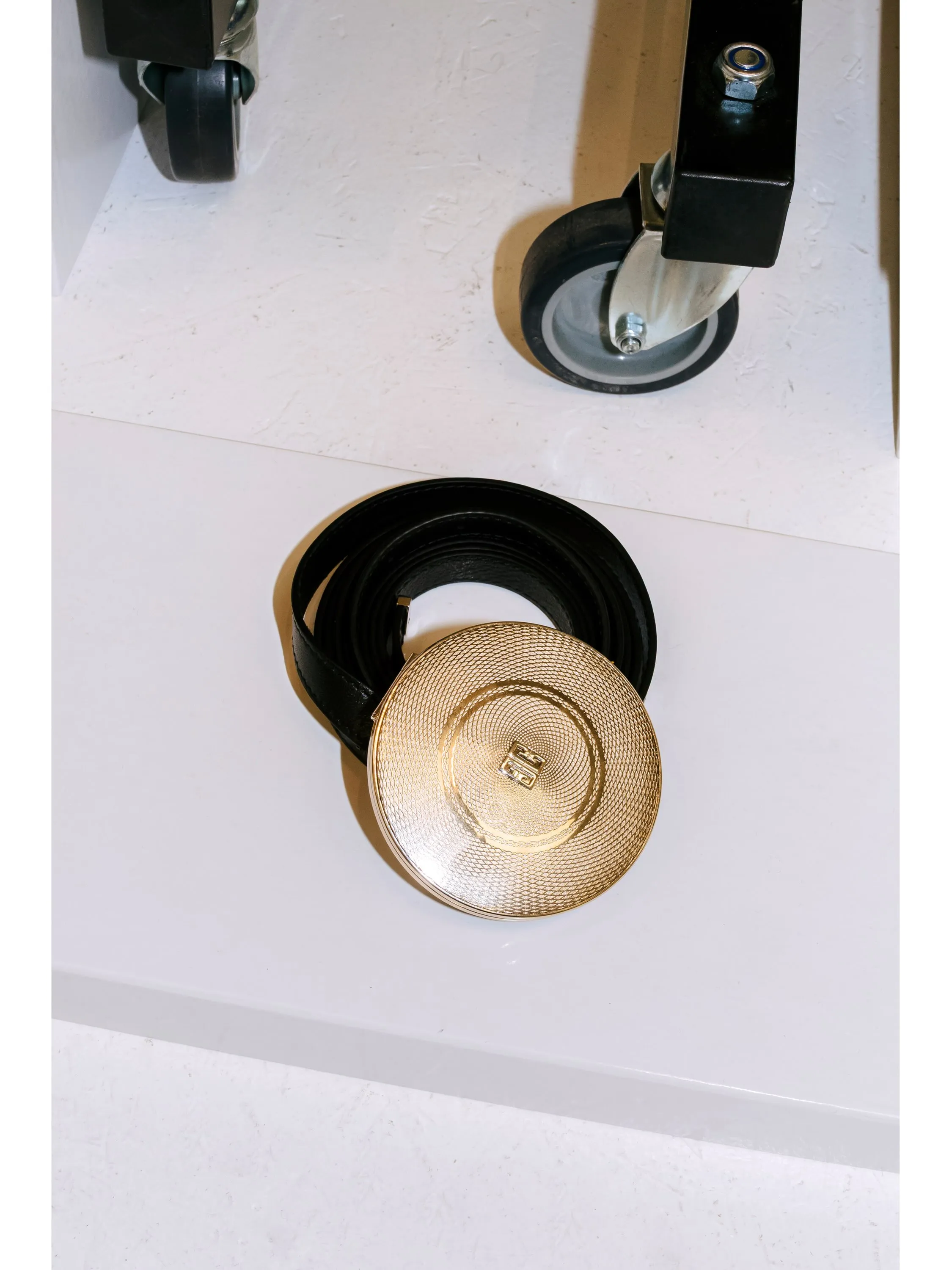 Model Soo Joo wearing a Givenchy Powder Puff belt in soft neutral tones