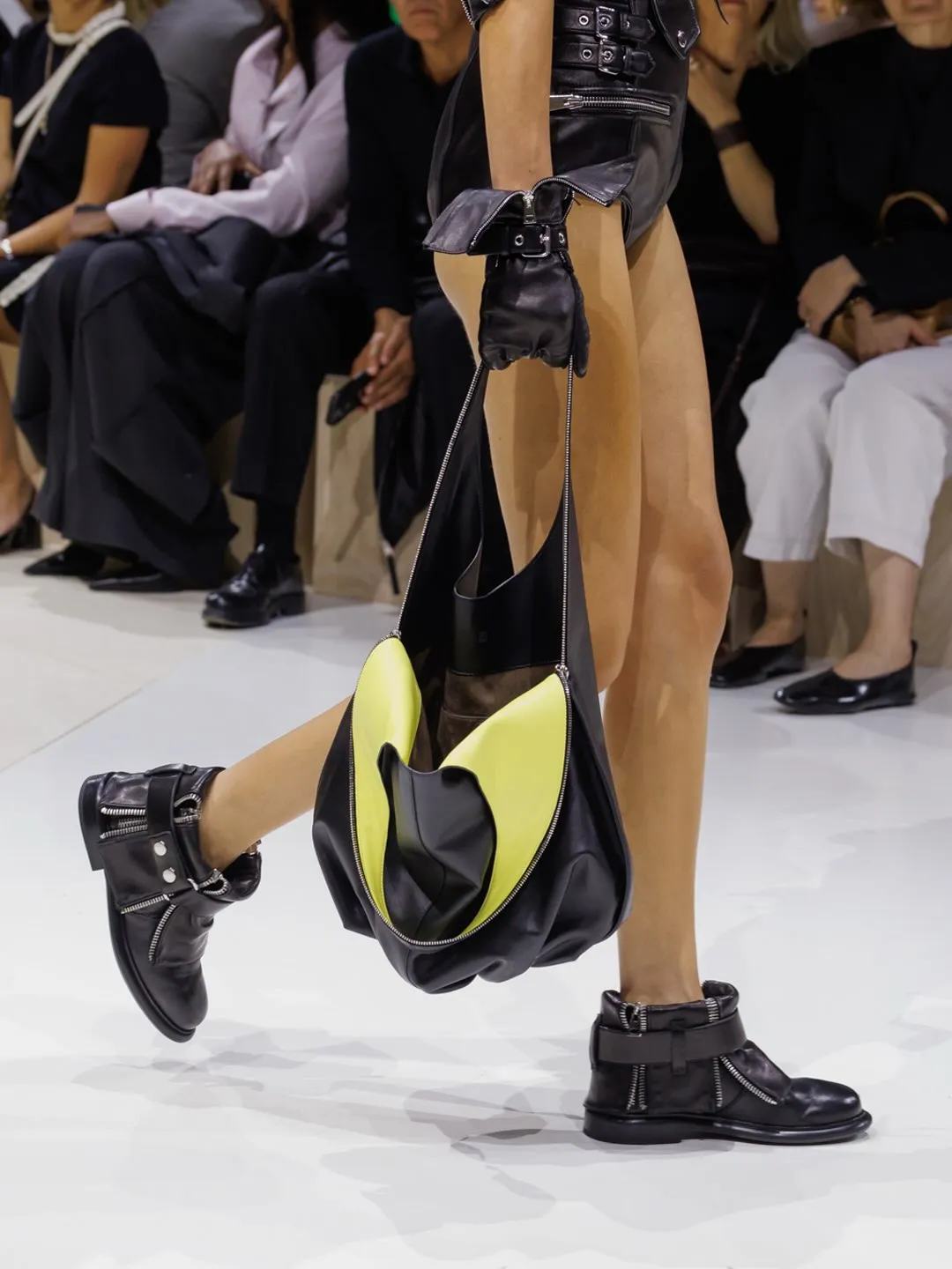 Full length view showcasing the all-in-one's sculpted proportions and fluid movement