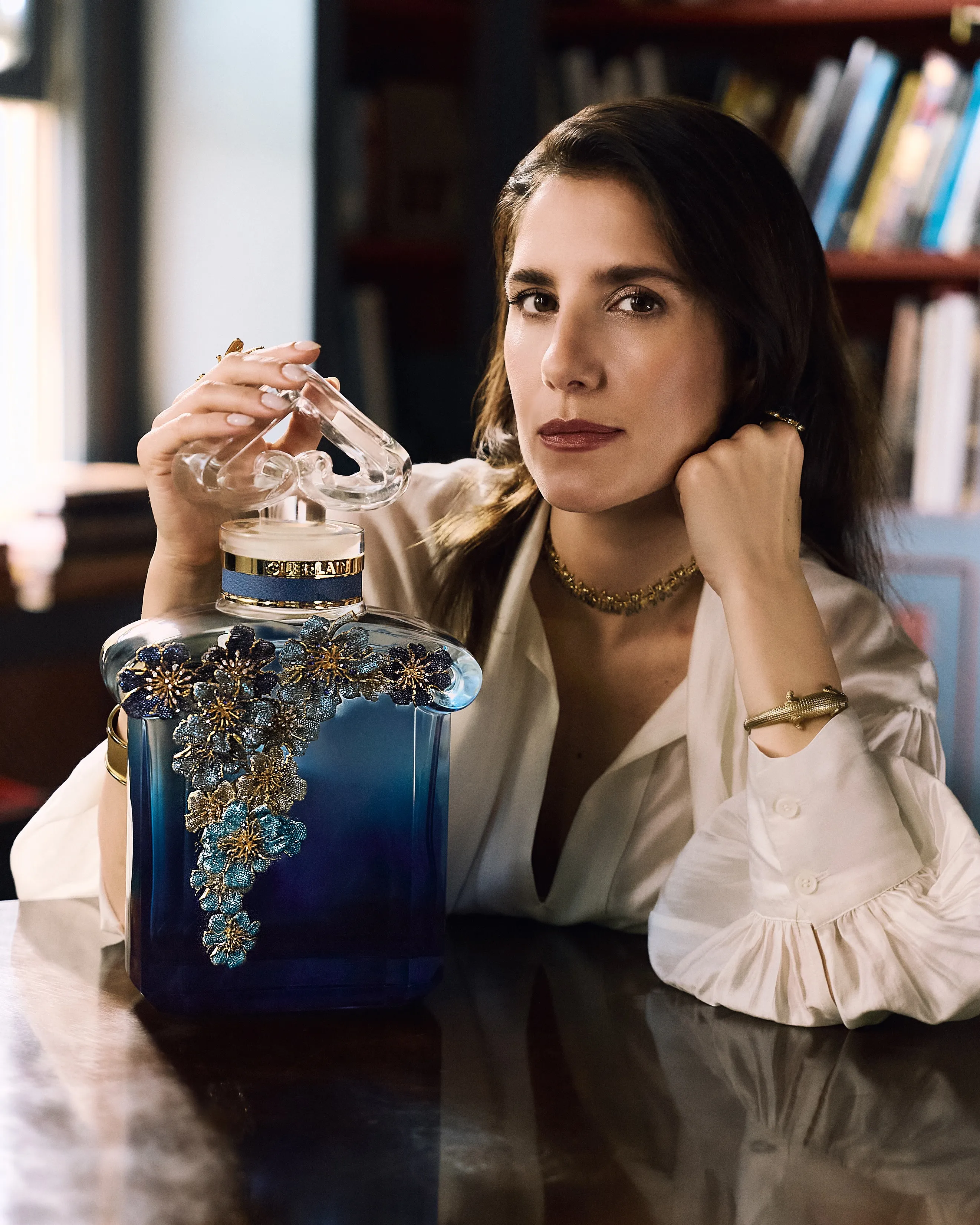 L'Heure Bleue fragrance bottle presented as an exceptional art piece with refined packaging and artistic presentation