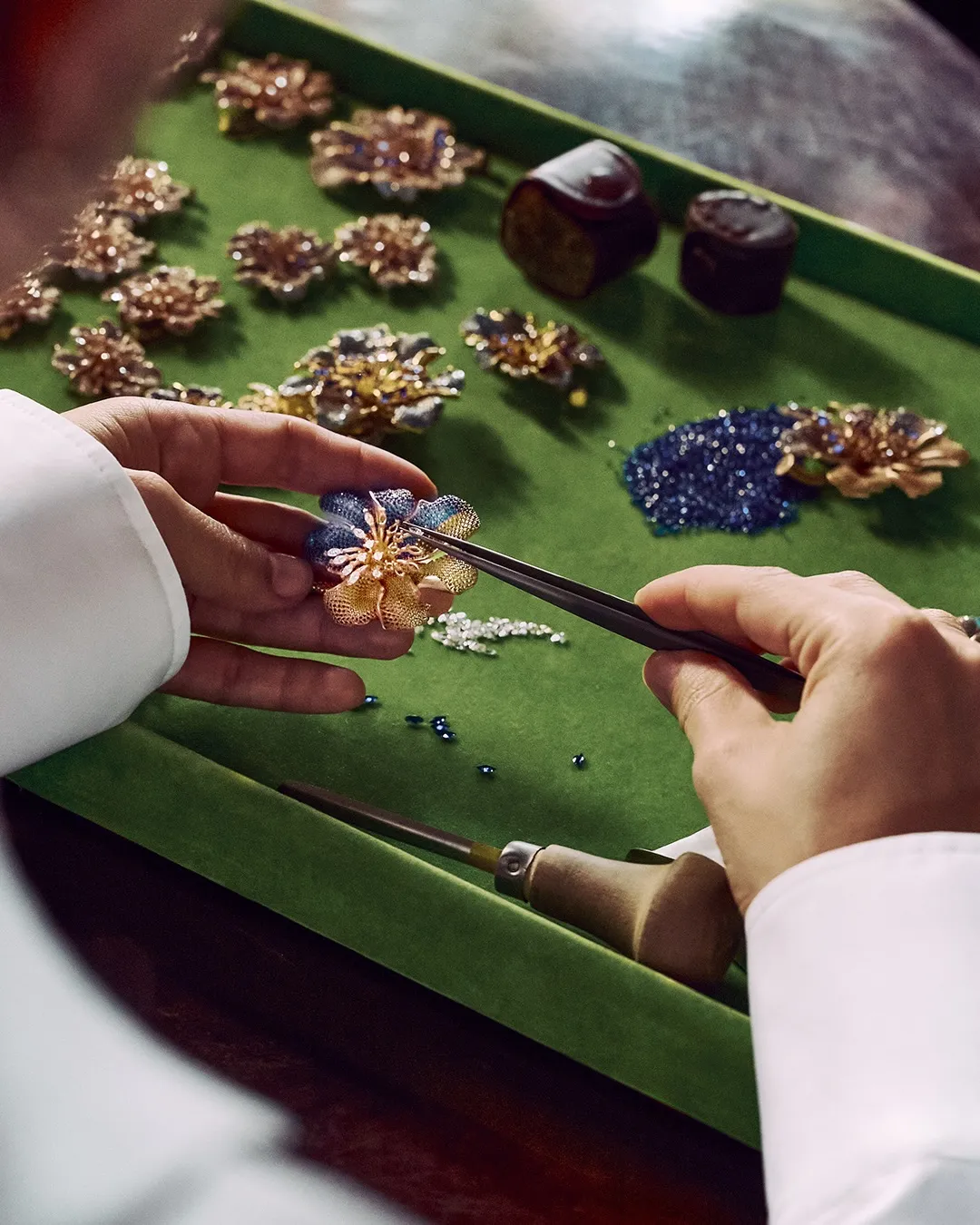 Detail of the exclusive L'Heure Bleue art piece creation showcasing craftsmanship and luxury design elements