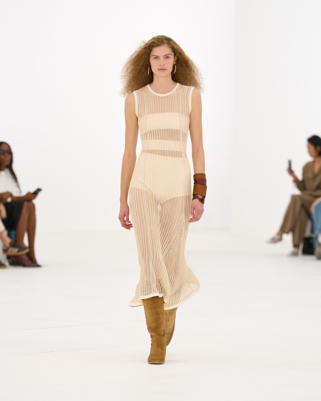 Flowing cream silk dress with architectural seaming and weightless silhouette from Hermès spring-summer 2027 collection