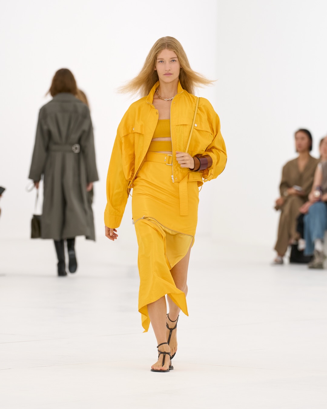 Layered modular pieces in complementary neutrals demonstrating reconfigurable design concept