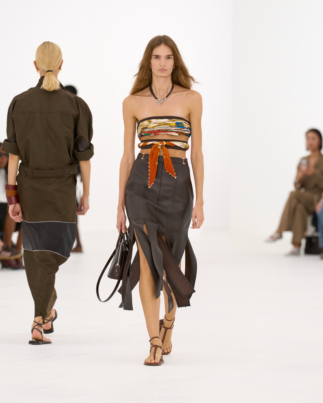 Full ensemble view of modular spring-summer collection in coordinated neutral palette