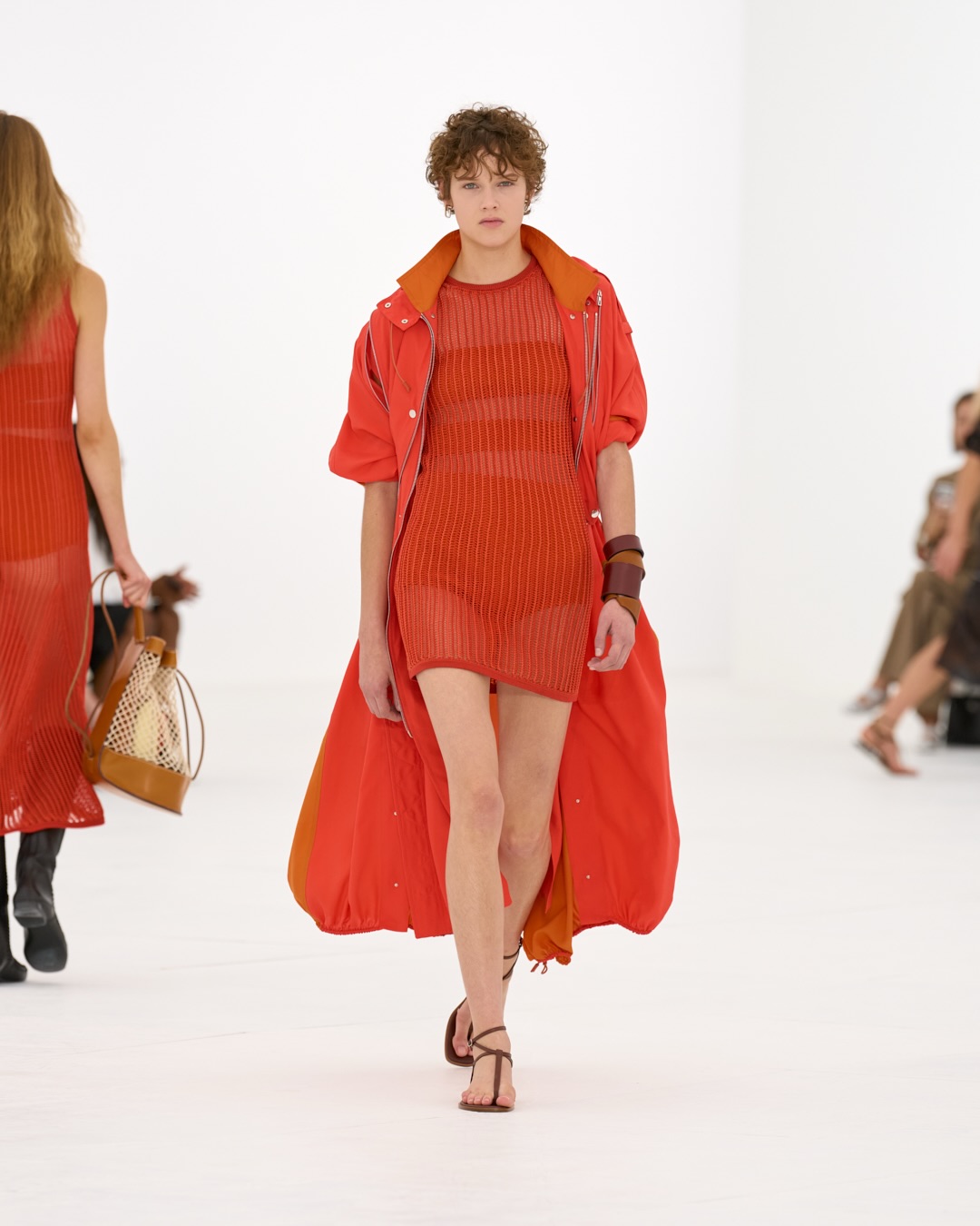 Closing look featuring the collection's signature balance of structure and ethereal lightness