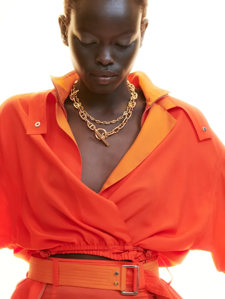 Detail shot of sleeve construction and draping technique characteristic of Nadège Vanhée's design approach