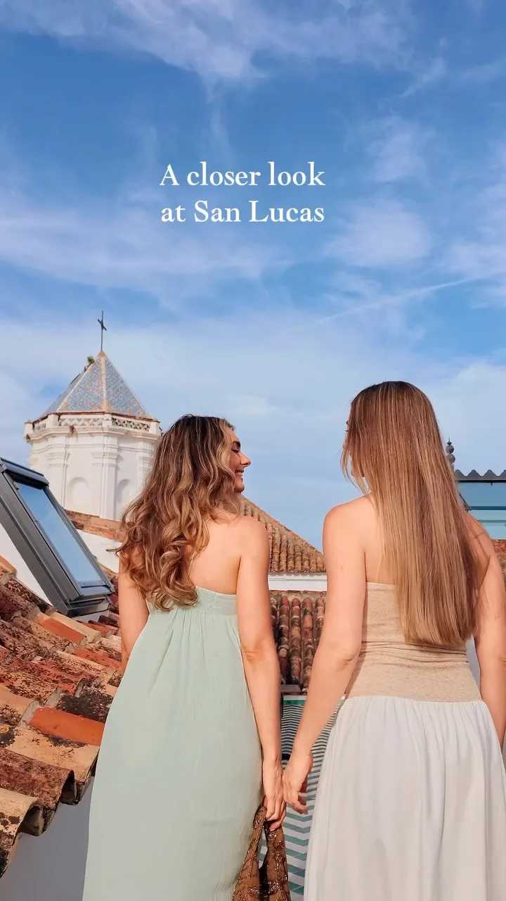 San Lucas rooftop terrace at Hotel Claude Marbella catching golden morning light above Marbella's rooftops and Mediterranean sky