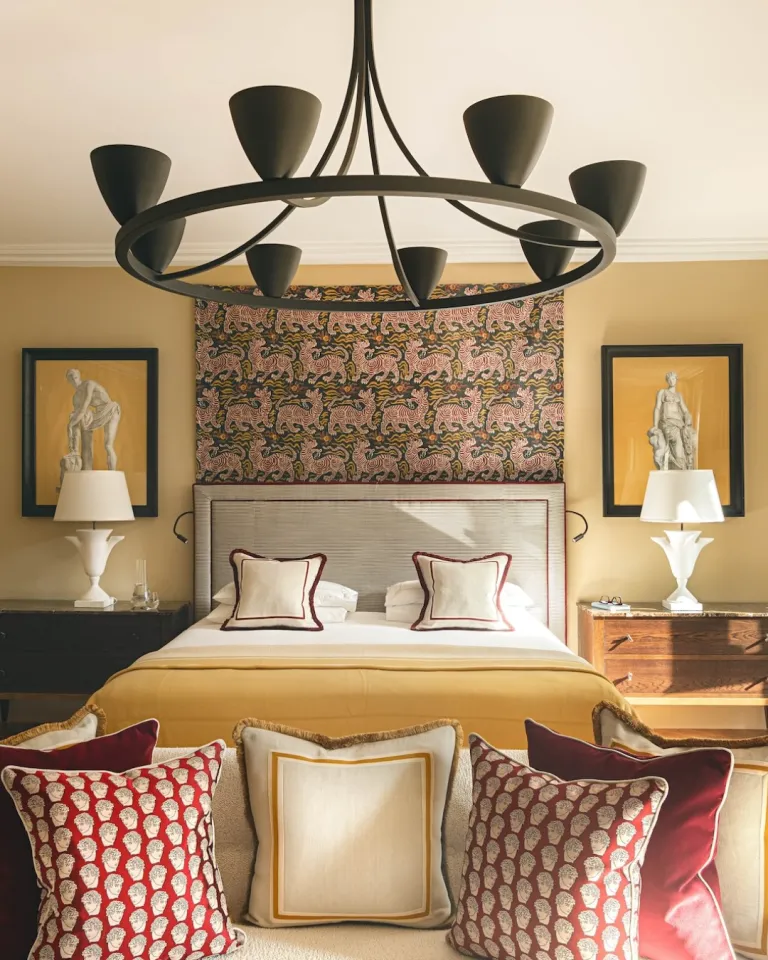 Sunlit hotel bedroom at Hotel de Russie with classical Roman proportions and contemporary furnishings bathed in morning light