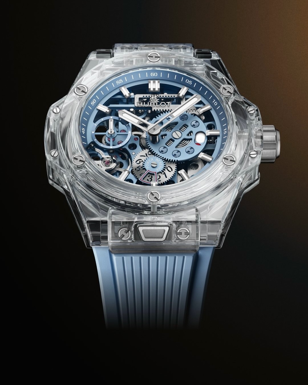 Hublot Big Bang Sapphire Sky Blue 44mm timepiece with completely transparent sapphire crystal case revealing the complex mechanical movement within