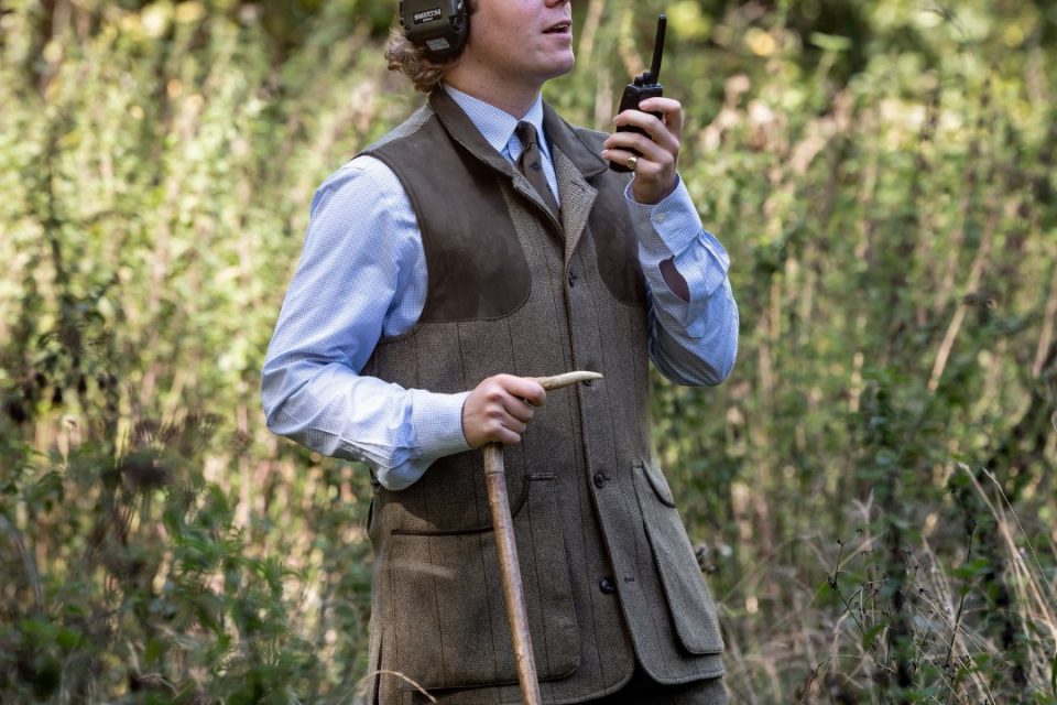Sportsmen with James Purdey and Sons shotguns during a driven grouse shoot across British moorland
