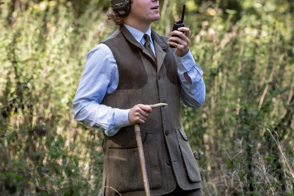 Sportsmen with James Purdey and Sons shotguns during a driven grouse shoot across British moorland