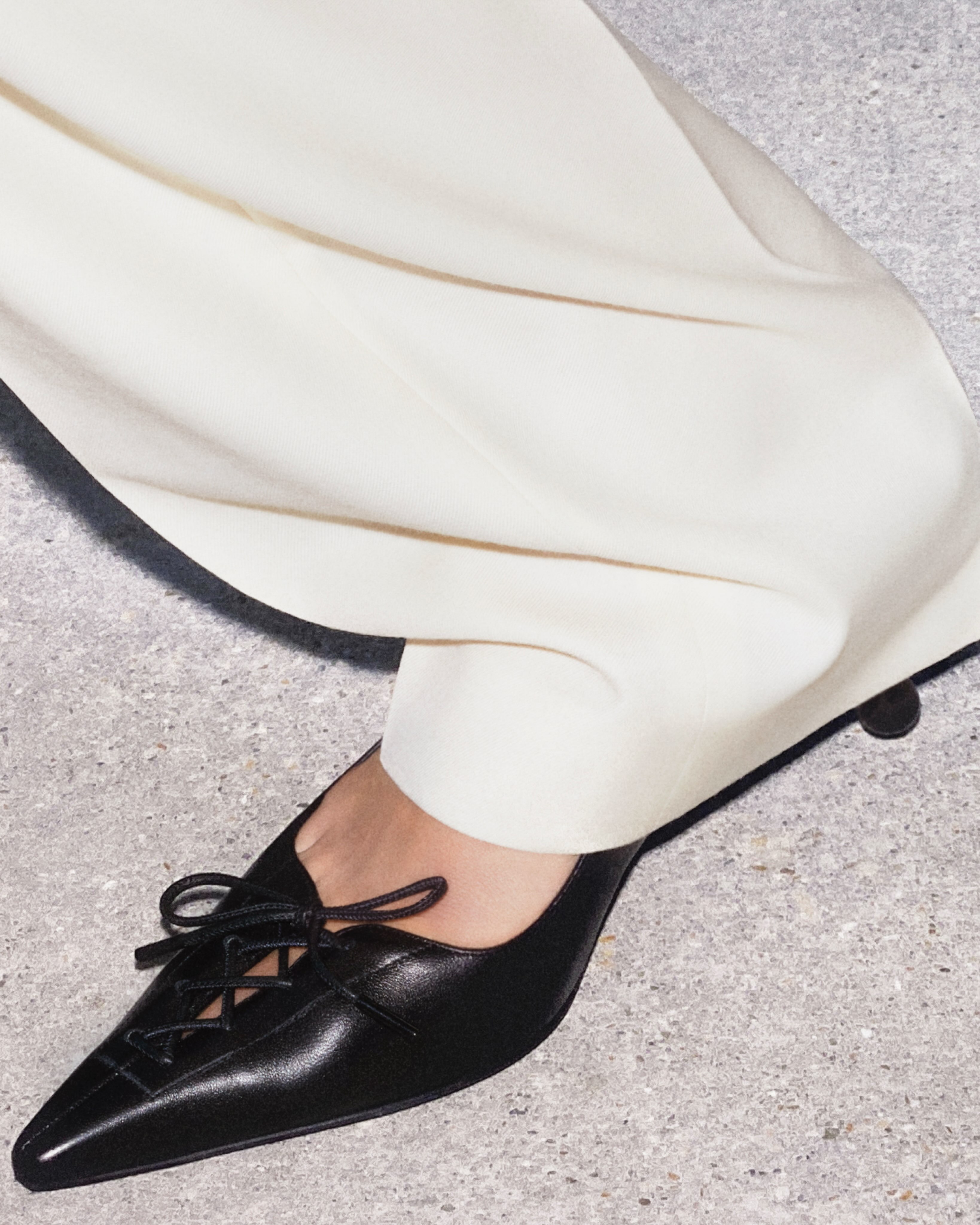 Jimmy Choo Scarlett pump featuring a corset-inspired upper, showcasing architectural tailoring and refined pump silhouette