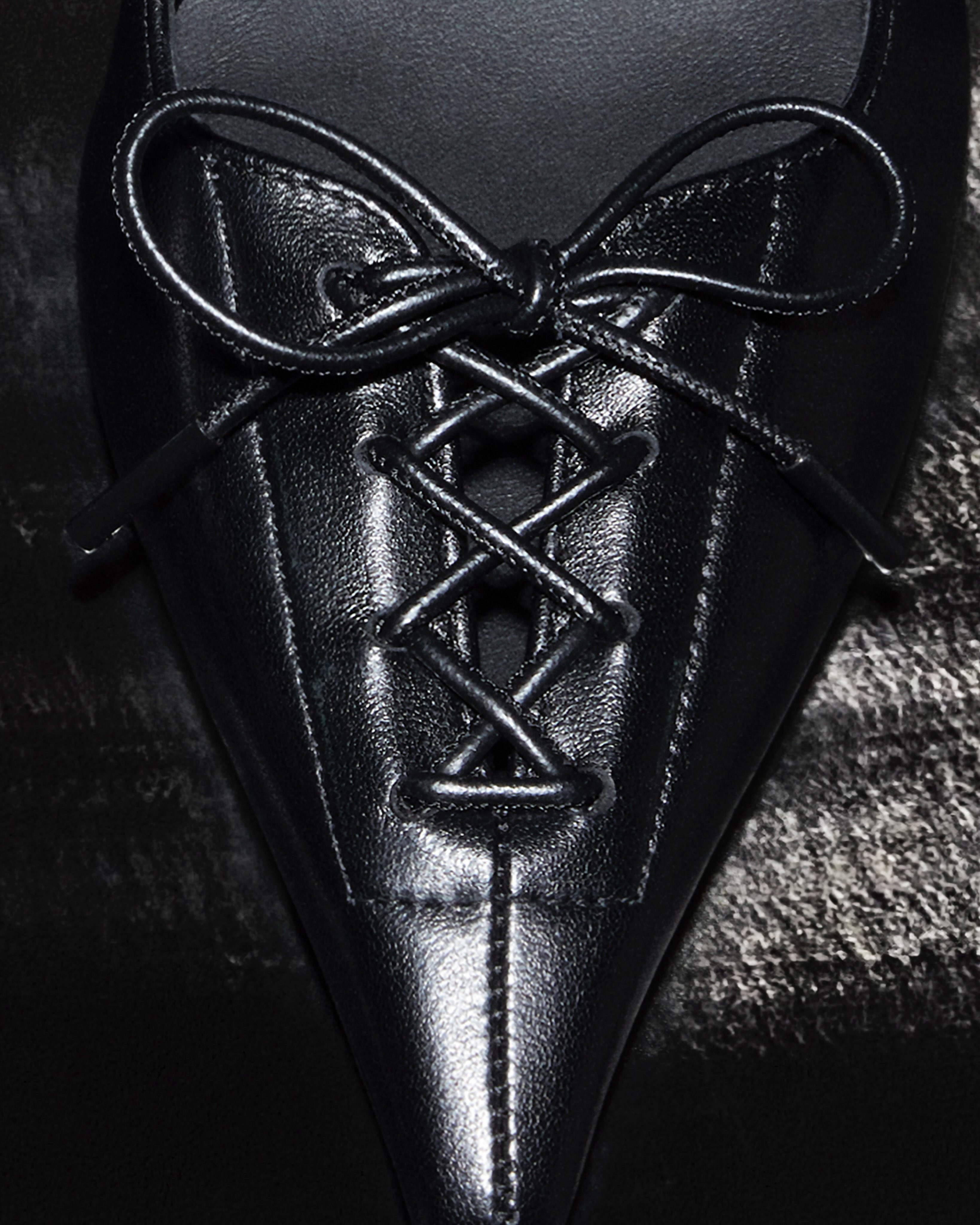 Jimmy Choo Scarlett pump featuring corset-inspired upper and sculptural drop heel in profile