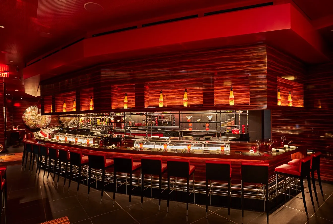 L'Atelier de Joël Robuchon Miami dining room with sophisticated table settings