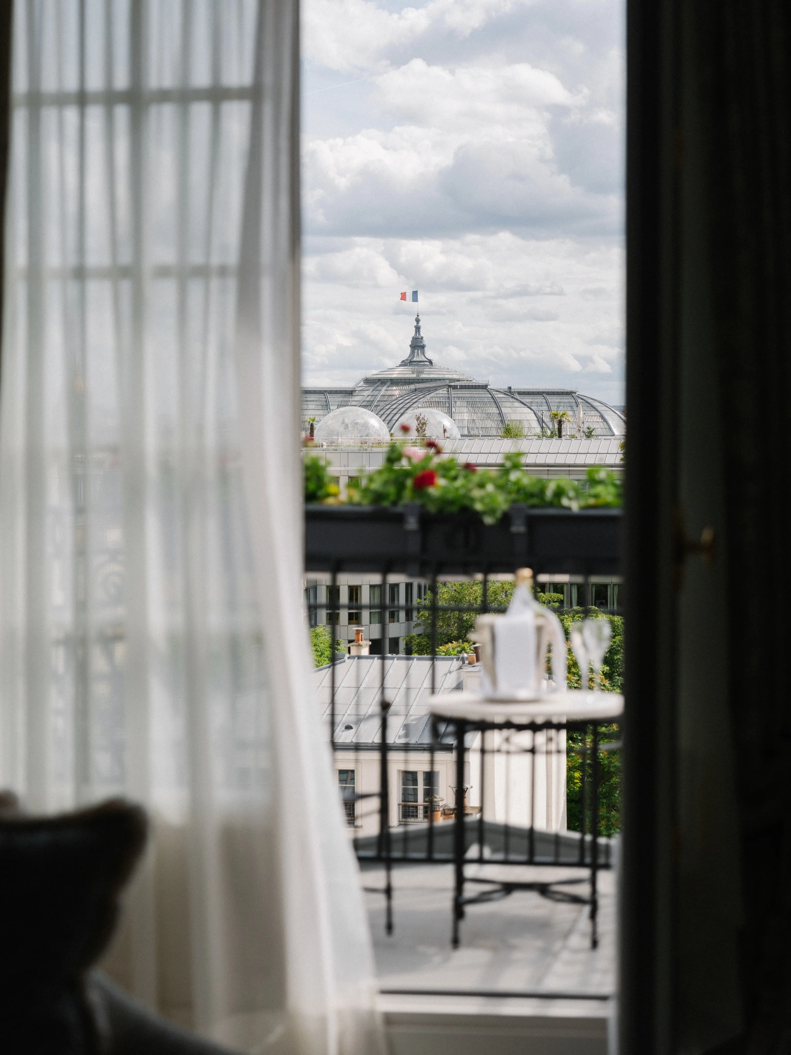 Elegantly appointed bedroom of the Honeymoon Suite at Le Bristol Paris featuring refined furnishings and soft ambient lighting