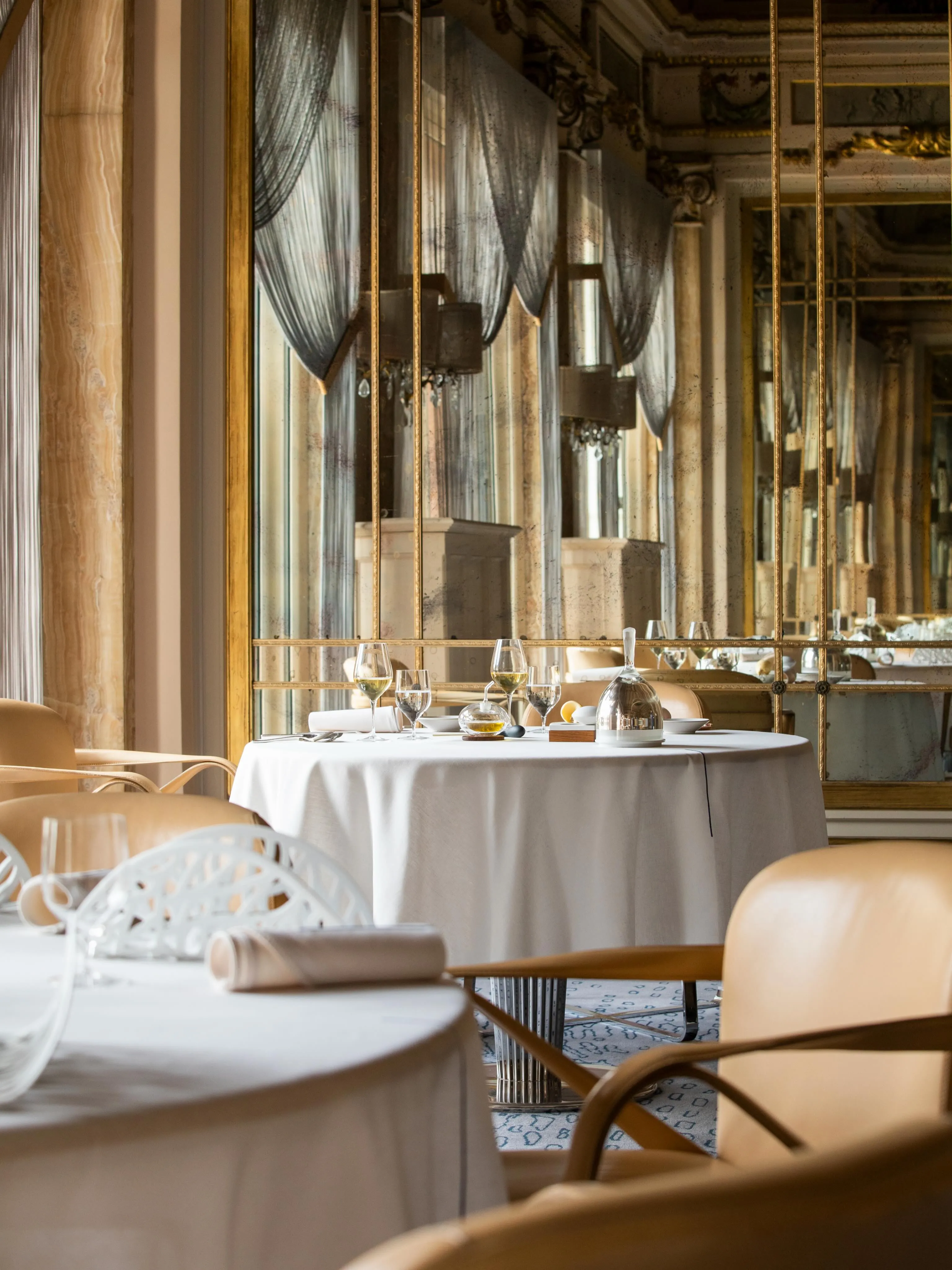 The reimagined dining room at Le Louis XV – Alain Ducasse in Monte Carlo, featuring contemporary design elements harmonizing with Monegasque classical architecture