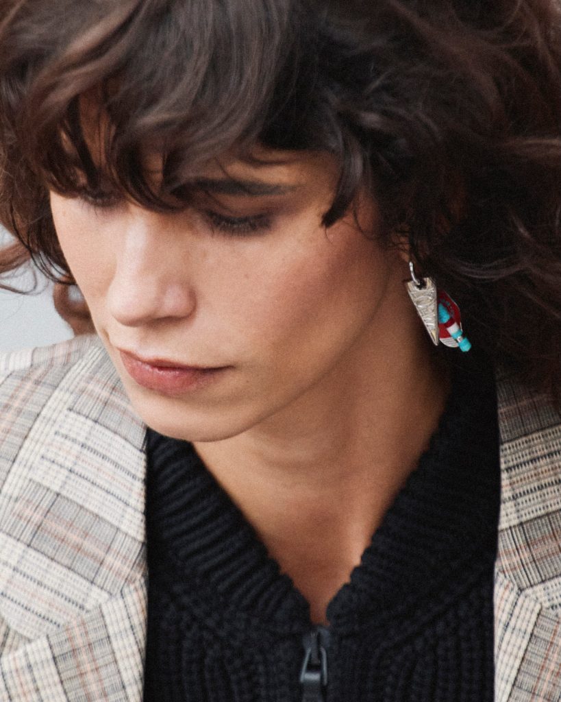 Close-up of baroque-influenced textile detail and contemporary colour palette