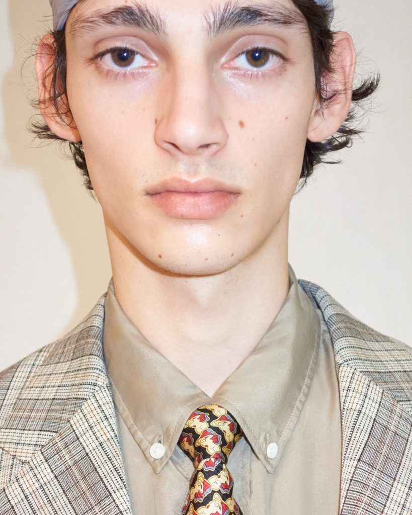 Overhead composition of Loewe pieces showing colour palette and texture layering