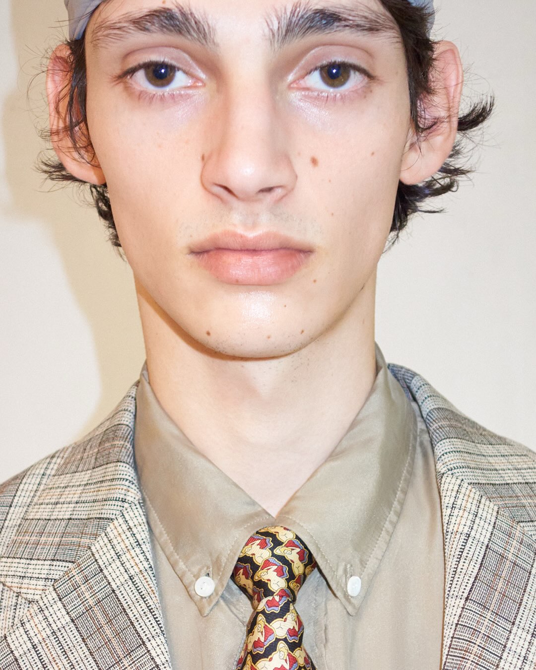 Overhead composition of Loewe pieces showing colour palette and texture layering